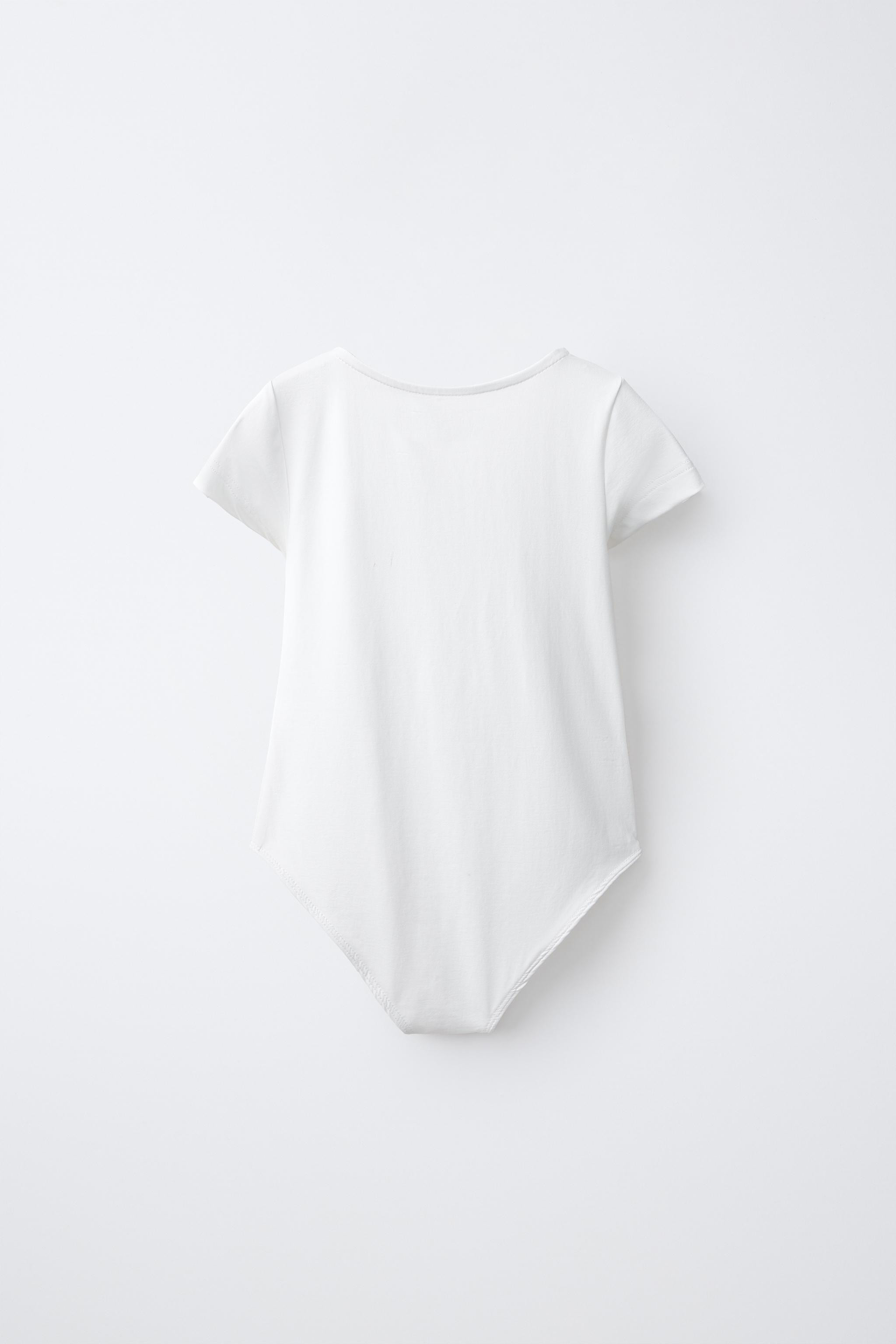 Short-sleeve bodysuit with a round neckline. Snap-button closure at the bottom. | Zara US