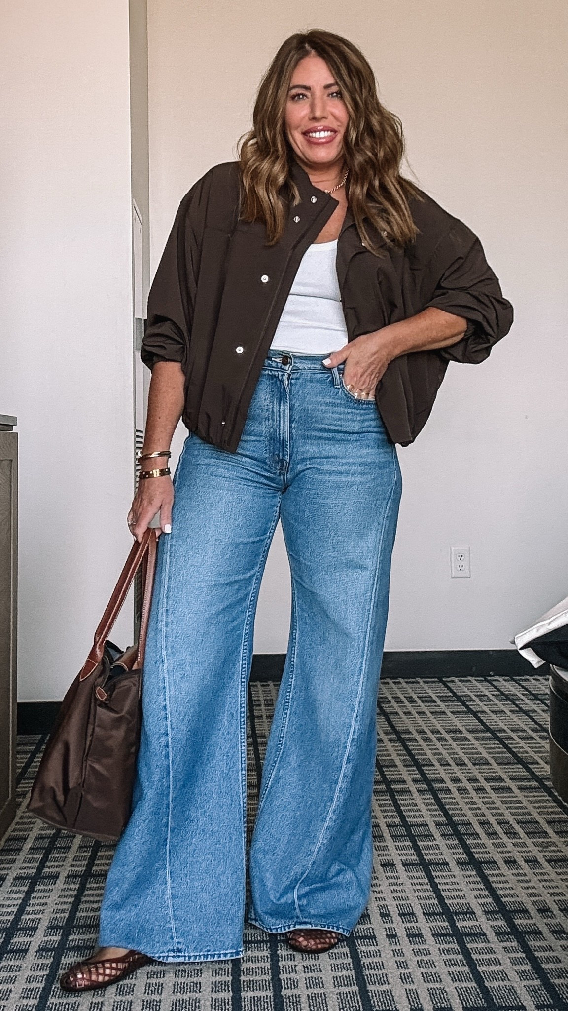 *adds outfit to fall rotation*

This @Aritzia  tank is an absolute dream! The fit is perfect. I’m wearing a medium.

This jacket looks and feels so high-end. It is a bubble bomber shape with zip pockets. I love the structure and the fit. I’m wearing a large. 

These mother jeans were a splurge, but I have been seeing this style for the last two years and I had to have it. The fit is so flattering and they are so extremely comfortable. I will definitely get my cost per wear out of these jeans and I got them on sale. You can save 10% off your first purchase on these when you sign up for email. I’m wearing a size 29. 
If you’re in between sizes like me and like a looser fit, then definitely go up.

My daughter talked me into this long champ bag and I must say it is my new favorite. Such an easy tote for the Mom on the go and it goes with everything.!

Jelly mules are a look for less from Amazon

Over 40 style, fall outfits women, mom style, autumn outfits, date night outfits

#LTKOver40 #LTKMidsize #LTKootd