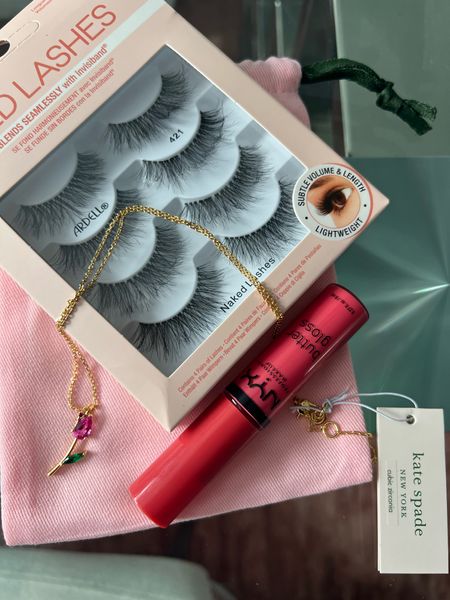 Spring essentials! A tulip Kate Spade gold necklace, my favorite NYX Butter Gloss in the shade Sorbet for the season and some fresh falsies for a serious flutter! Happy spring 🌷 
.
.
.
.
#goldnecklace #targetfinds #lipgloss #falselashes #springtrends #giftsforher #spring #beautyfinds #lippy 

#LTKbeauty #LTKFind #LTKSeasonal