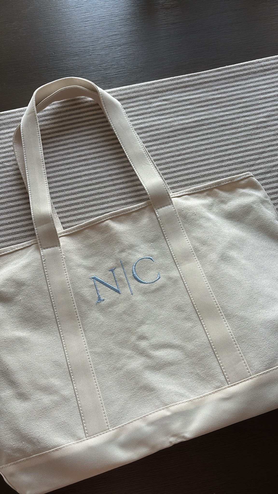 Snagged this cute custom embroidered tote bag for my vacation this summer! On sale for less than $20 🚨 

#LTKVacation #LTKBag

#LTKsummer #LTKsale #LTKtravel