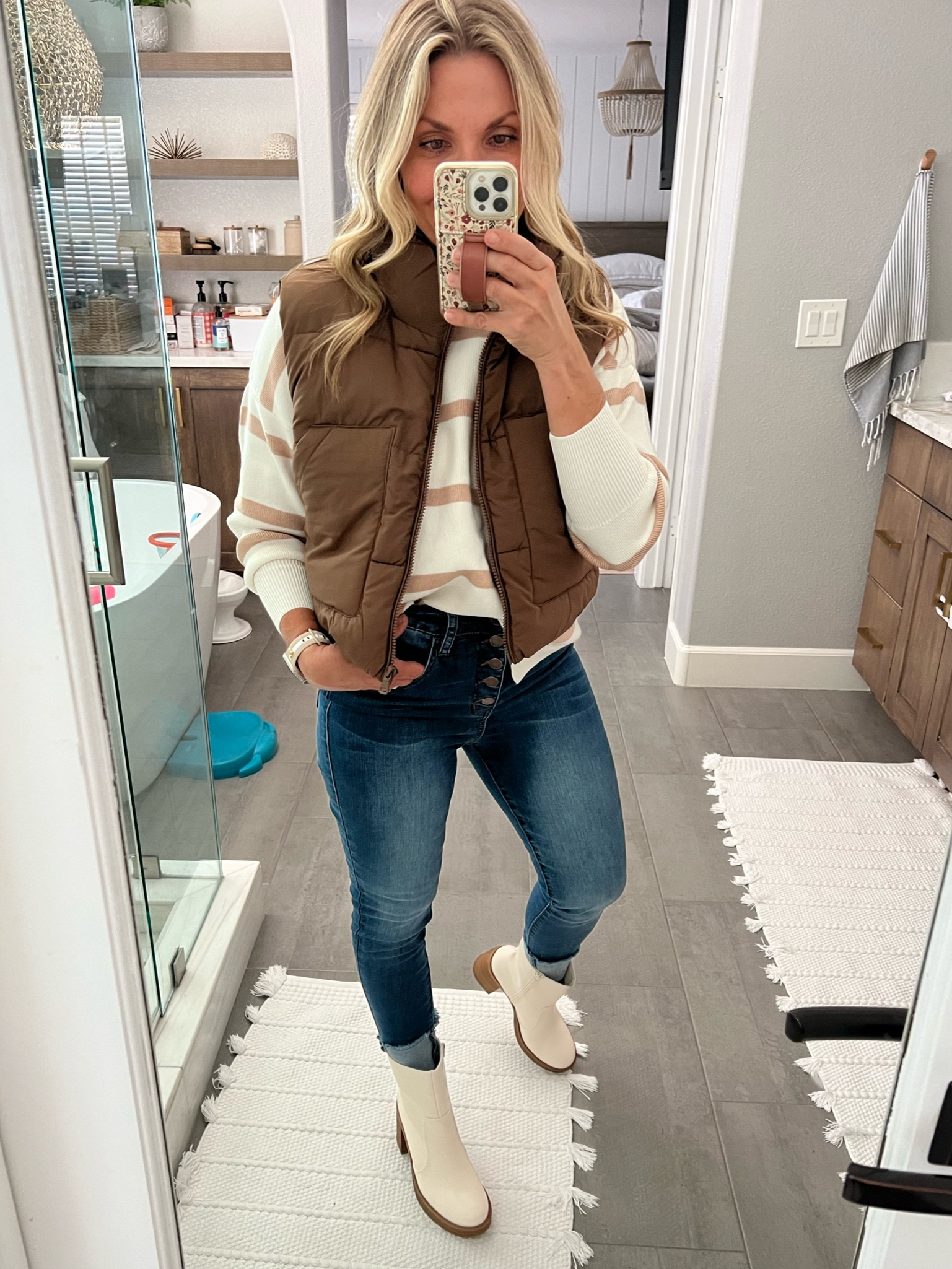 Cutest cropped puffer vest! Medium weight would be so cute to add warmth to your favorite fall outfit, would be equally cute over your workout clothes too.

#LTKover40 #LTKSeasonal #LTKfindsunder50