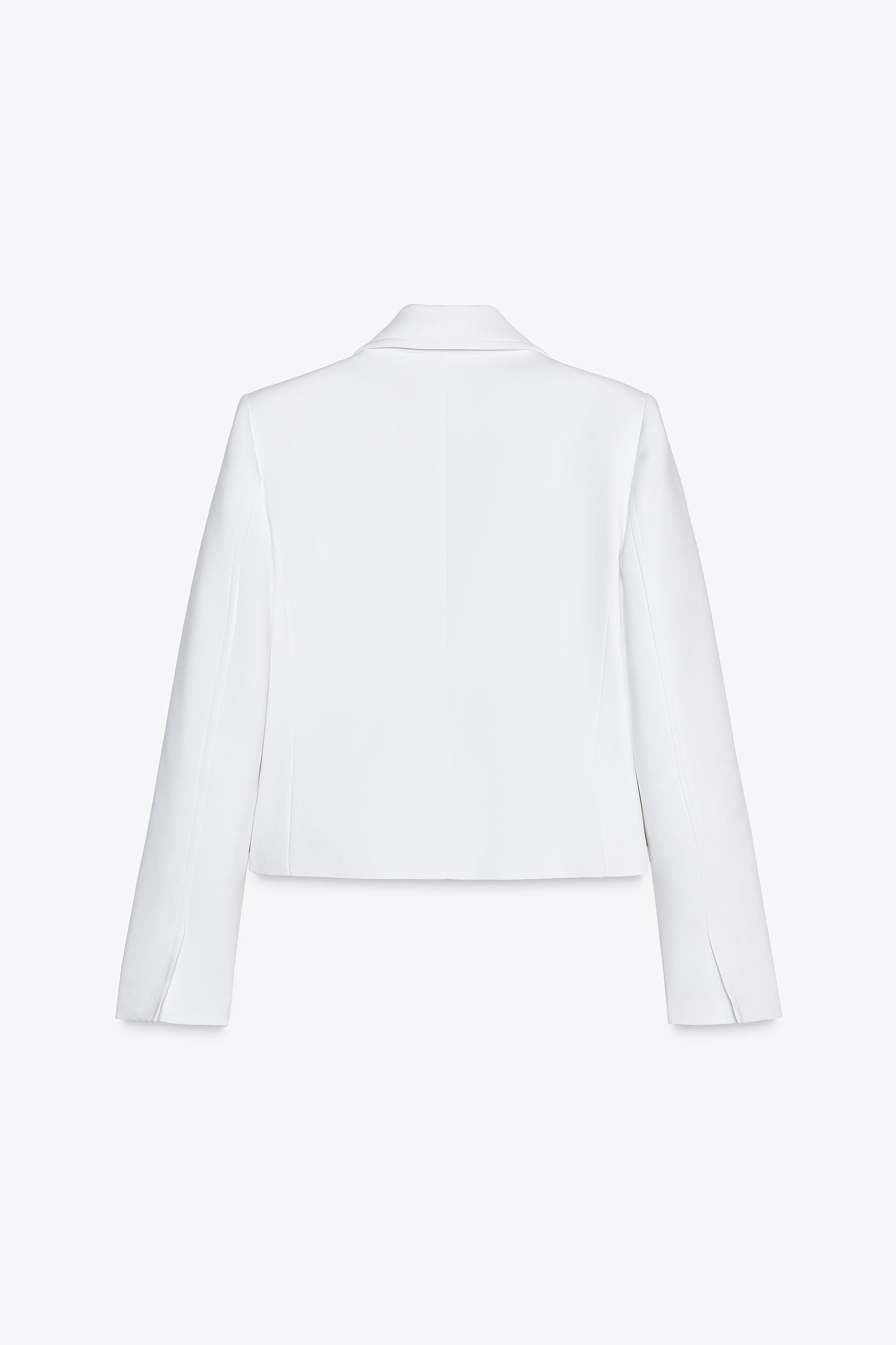 Blazer with lapel collar and long sleeves with shoulder pads. Front double breasted button closur... | Zara US