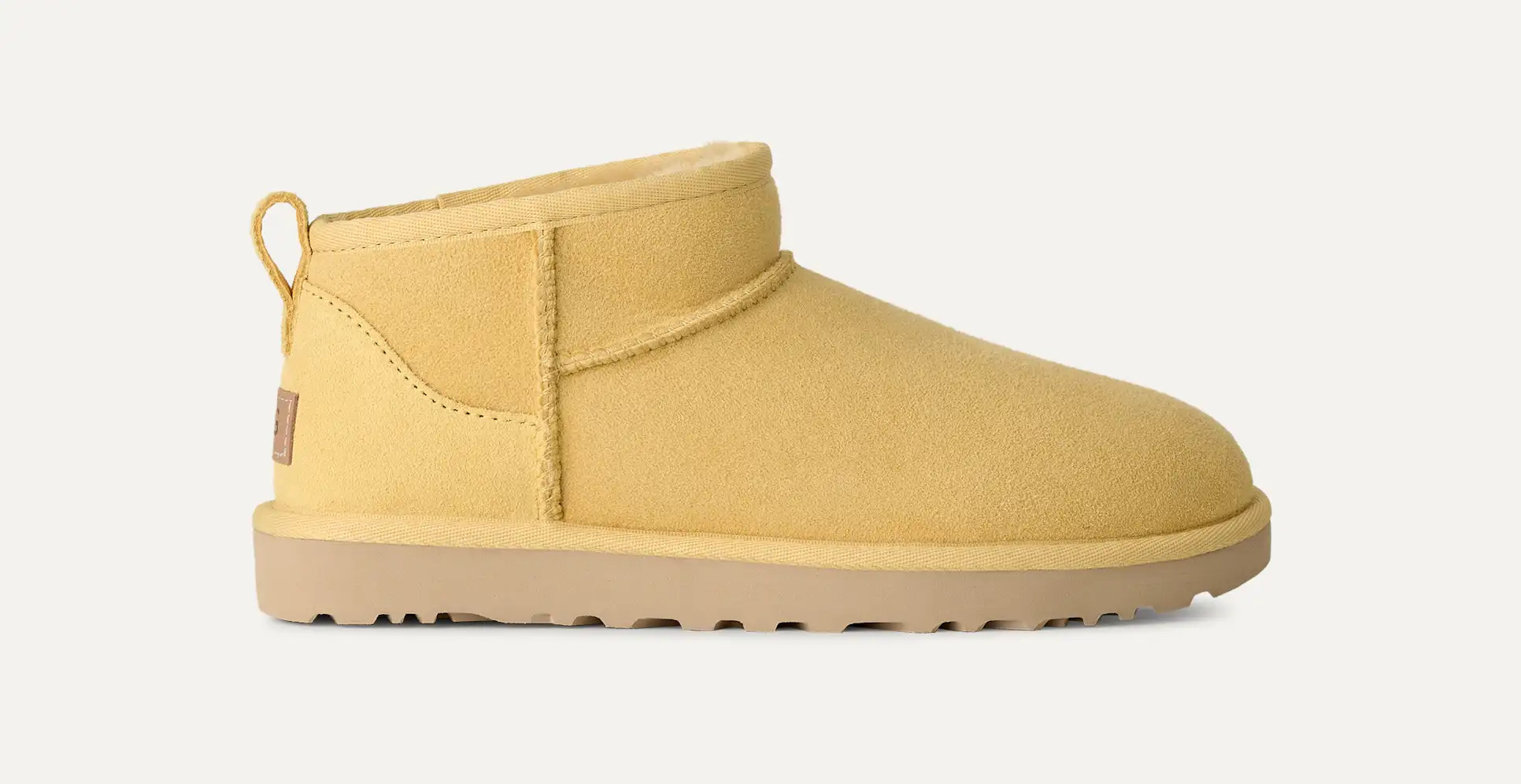 UGG® Women's Classic Ultra Mini Sheepskin Classic Boots in Sand, Size 7 | UGG (US)