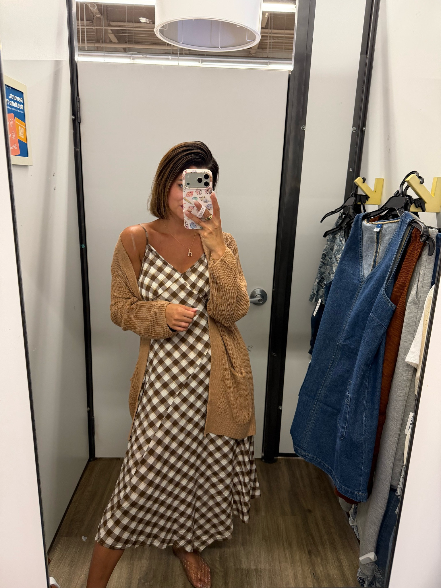 Old Navy is having an online exclusive sale right now — 50% off everything (even new arrivals)! 

Another amazing fall outfit option! This longline open-front wrap cardigan has pockets and it is SO soft! It looks great layered over this brown and white plaid fit & flare midi dress.

Wearing a small in both pieces!

#LTKSaleAlert #LTKootd #LTKSeasonal