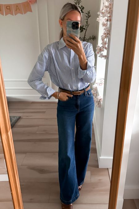 Spring outfit. Blue stripe button down is slightly oversized. I reccomend sizing down. Wide leg Jeans, if you are inbetween I would size down. Shoes I went up half a size for roomier fit. Amazon belt. 

Old rich money, gap jeans, wide leg jeans, high waisted jeans, dark wash jeans, button, striped blouse, work outfit, spring outfit, summer outfit, Amazon belt, brown Amazon belt, Hamilton outfit, old rich money, casual outfit, affordable fashion, brown strap it shoes, brown heels, target top, target outfit, target sandals, target shoes 

#LTKTravel #LTKShoeCrush #LTKSaleAlert