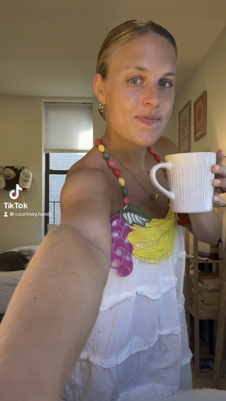 size down!!!! I’m wearing a small and had to pin it in the back <3