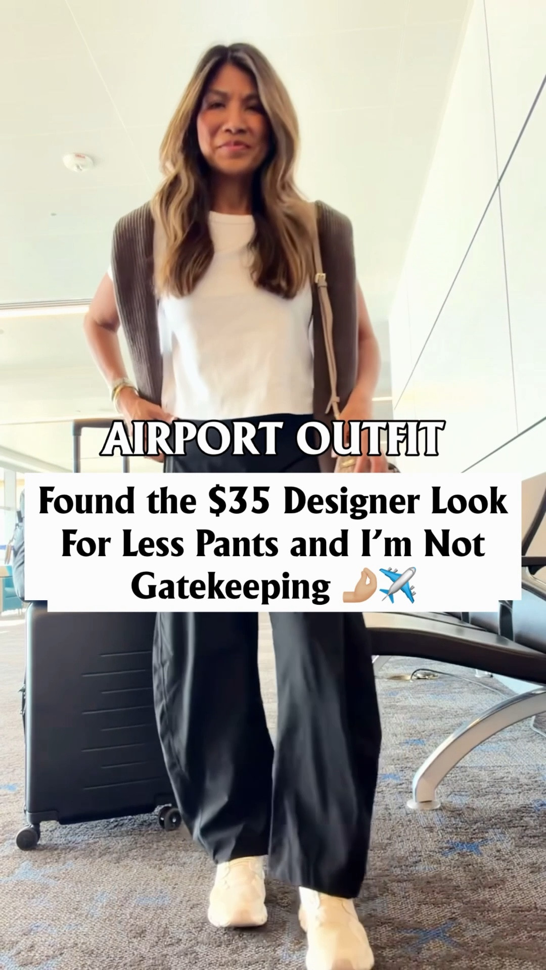 I’m 5’2” 118#ish for reference 
Pants in small tts, black and I also have the coffee and apricot.
White tee in small tts.
Sneakers fit tts color Pearl White.
Sweater in small.
Luggage is the expandable carryon size. Personal black airport bag is the regular size.
Purse in size small.
airport outfit, travel outfit, comfy pants, Amazon finds, fashion over 40, over 50 style, midlife womenpetite fashion,midlife fashion, affordable fashion, 


#LTKOver40 #LTKPetite #LTKTravel