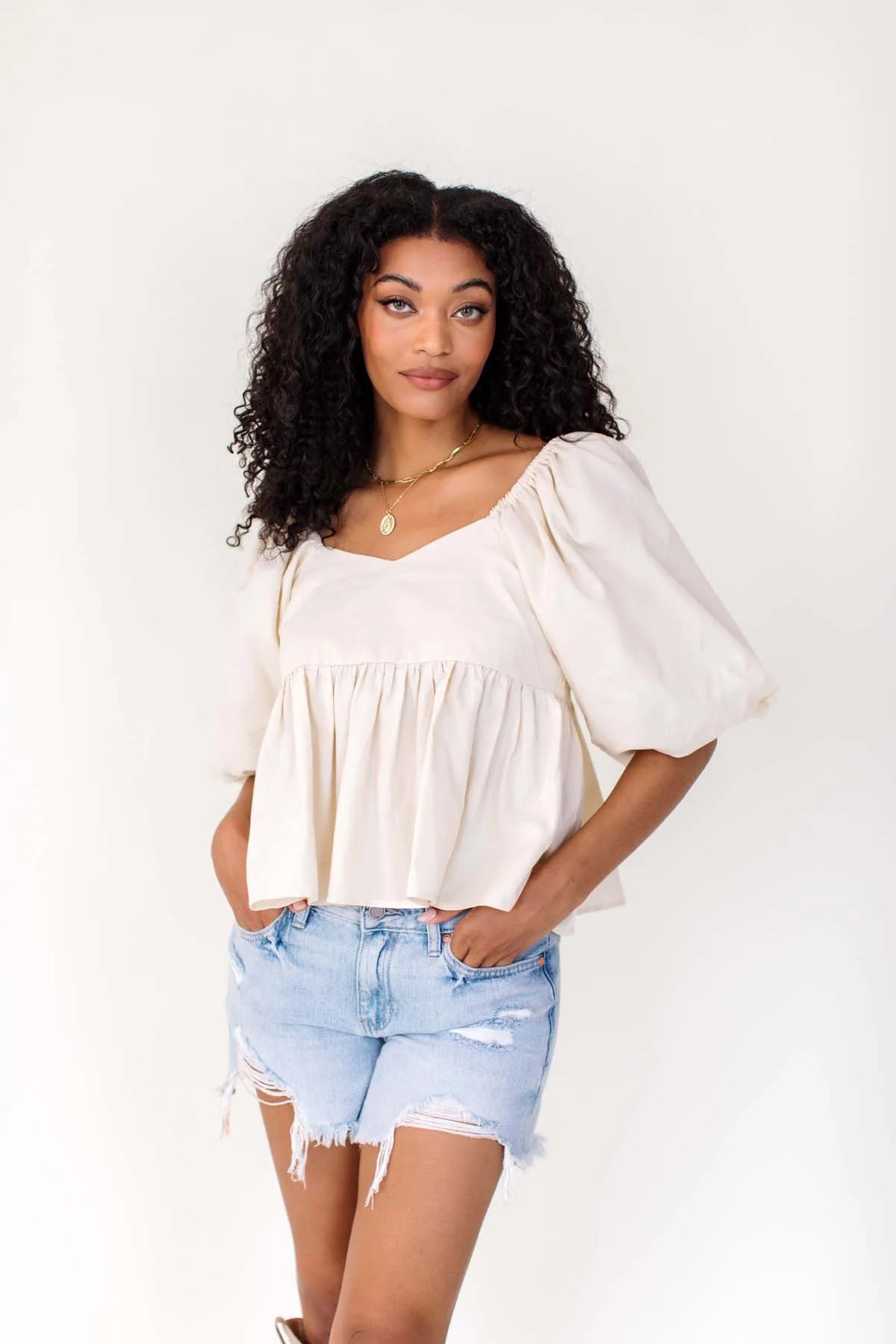 Maya Peplum Top | The Post