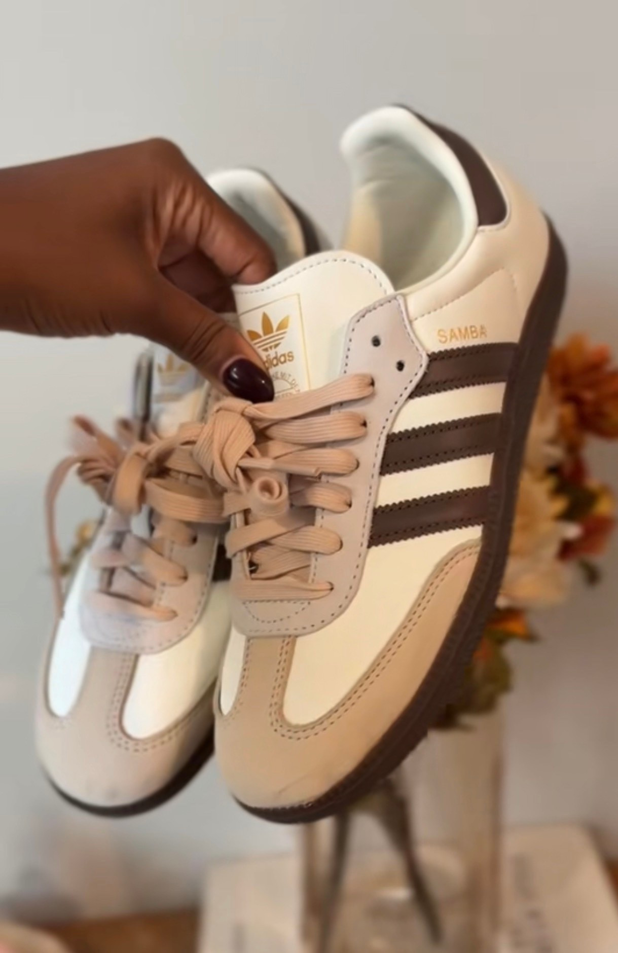 Effortlessly classic. These brown and white Adidas bring together comfort and timeless style, making them an easy everyday staple. Clean, versatile, and always on trend, they pair perfectly with relaxed looks while still feeling polished. A go to pair that proves simple can still stand out.