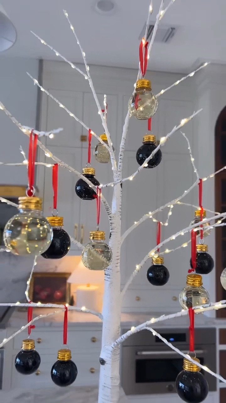 The viral wine tree is back! Grab all your booze balls before they sell out! The tree I used is the 48” birch! All linked for you here! Cheers! 

#LTKHoliday #LTKHome