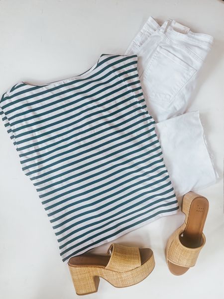 Navy stripes and fresh white jeans. This makes for such a chic, classic look. Bonus points if you tie a cardigan around your shoulders.
These white jeans are from Kut from the Kloth. They are flares  that run TTS and have just the right amount of stretch. The top is a super flattering boat neck. It has a slim, narrow cut, I’d suggest sizing up in the top.
Jeans, summer outfits, platform sandals, classic styles, striped, travel outfit, vacation outfit, work outfit 

#LTKWorkwear #LTKShoeCrush #LTKFindsUnder100