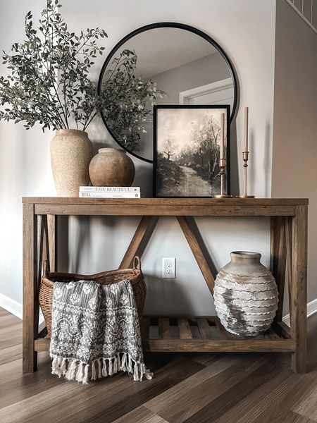 Console Table | Entryway | Pottery Barn Vase | Faux Stems | Round Mirror | Candle Holders

#LTKHome #LTKStyleTip