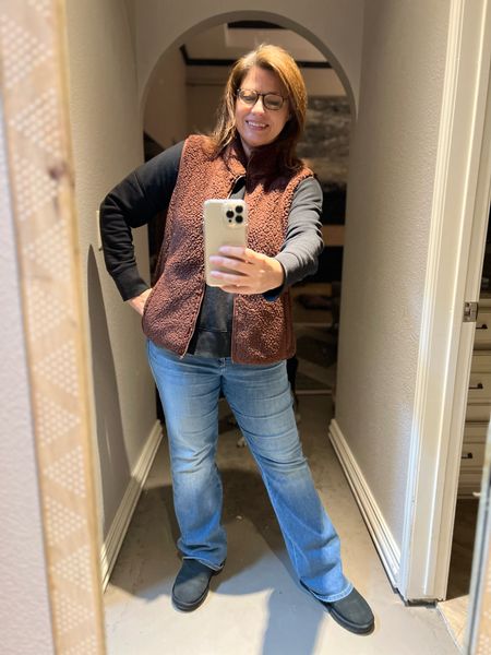 Love a snuggly vest, jeans, Uggs, and this $12 sweatshirt this time of year.

#LTKstyletip #LTKshoecrush #LTKunder50