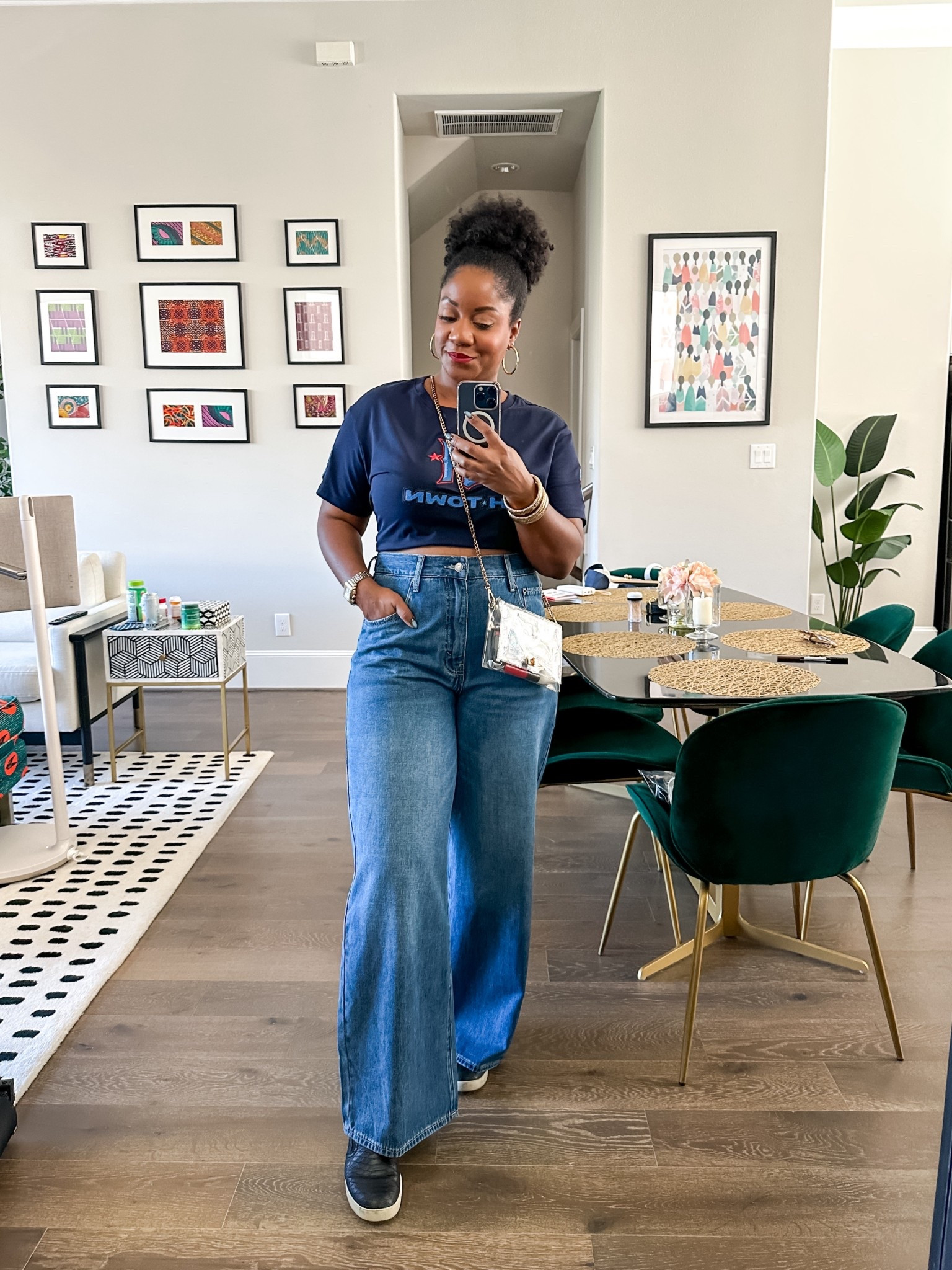 Game day style in a Texans cropped tee (I tied it with a hair tie in the back and tucked it into my bra to make it more fitted), @nextrys.us wide leg jeans, and sneakers. Wearing a 32 in the jeans. #nextrys #nextrysjeans

football game day outfit / game day style / casual football outfit / wide leg jeans outfit / graphic tee outfit / sneakers outfit / fall casual outfit / midsize game day look / tailgate outfit ideas / casual weekend style / comfortable game day fashion / denim outfit inspo / Amazon fashion finds / clear bag outfit / stadium approved clear bag

#LTKMidsize #LTKStyleTip #LTKFindsUnder50
