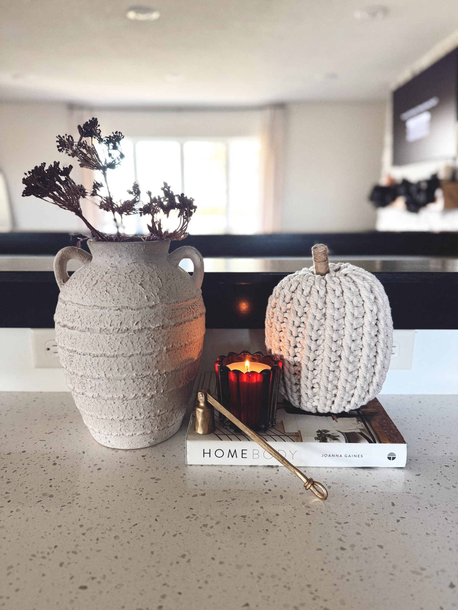 Fall textures make everything feel so cozy 🍂 This Hobby Lobby textured vase is one of my favorites, and paired with a knit pumpkin + moody candle on top of a book stack = perfection. Linked all the similar pieces so you can get the same layered look! #LTKhome #fallhomedecor #LTKfinds #cozyhome #neutralhomedecor #homeinspo #ltkbest