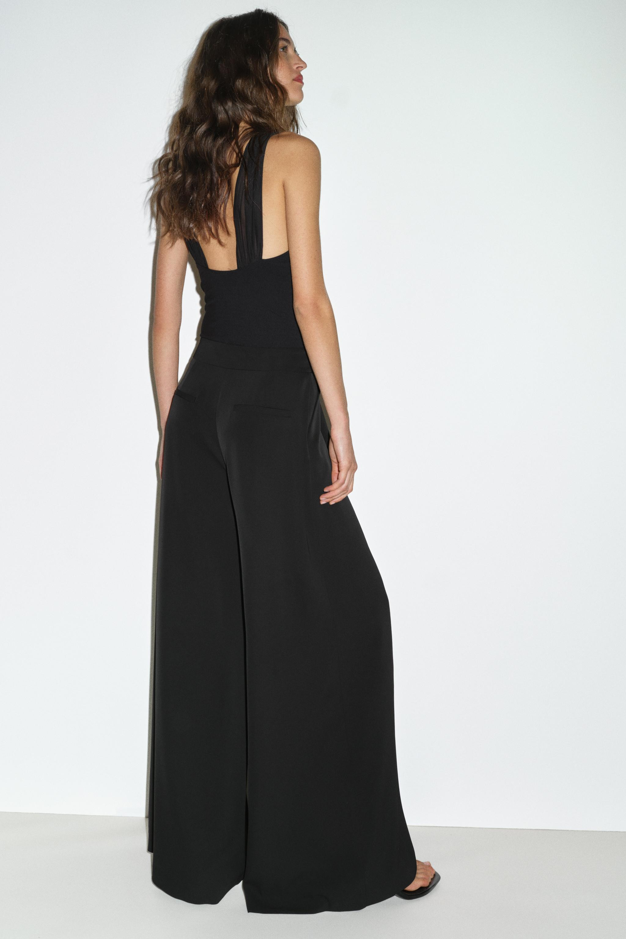 PALAZZO TROUSERS WITH GOLDEN BUTTON | Zara UK