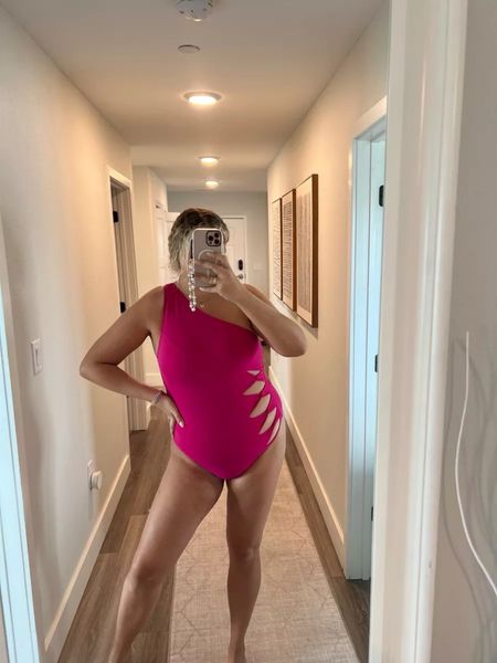 Love the side cutouts of this Carmen Marc Valvo One piece swim. I couldn’t find a link to the hot pink one but the black and blue are still so cute!! Curvy girl swim, one shoulder swim, summer outfit, pool outfit, beach outfit

#LTKSeasonal #LTKswim #LTKmidsize