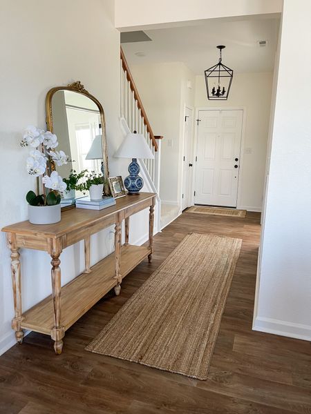 Coastal traditional entryway/ world market entryway table / primrose mirror anthropology/ Ralph Lauren vintage blue and white lamp / southern classic /classic home/ coastal home style entryway decor style / southern home decor / classic home decor / traditional home decor / entryway styling / jute entryway rug / coastal entryway table / southern home style / coastal
Home decor / / spring home decor / blue chinoiserie lamp / coastal coffee table books/ blue coffee table books 
Home decor 

Follow my shop @StyledByAdell on the @shop.LTK app to shop this post and get my exclusive app-only content!

#liketkit #LTKhome #LTKunder100 #LTKstyletip
@shop.ltk
https://liketk.it/41FhN