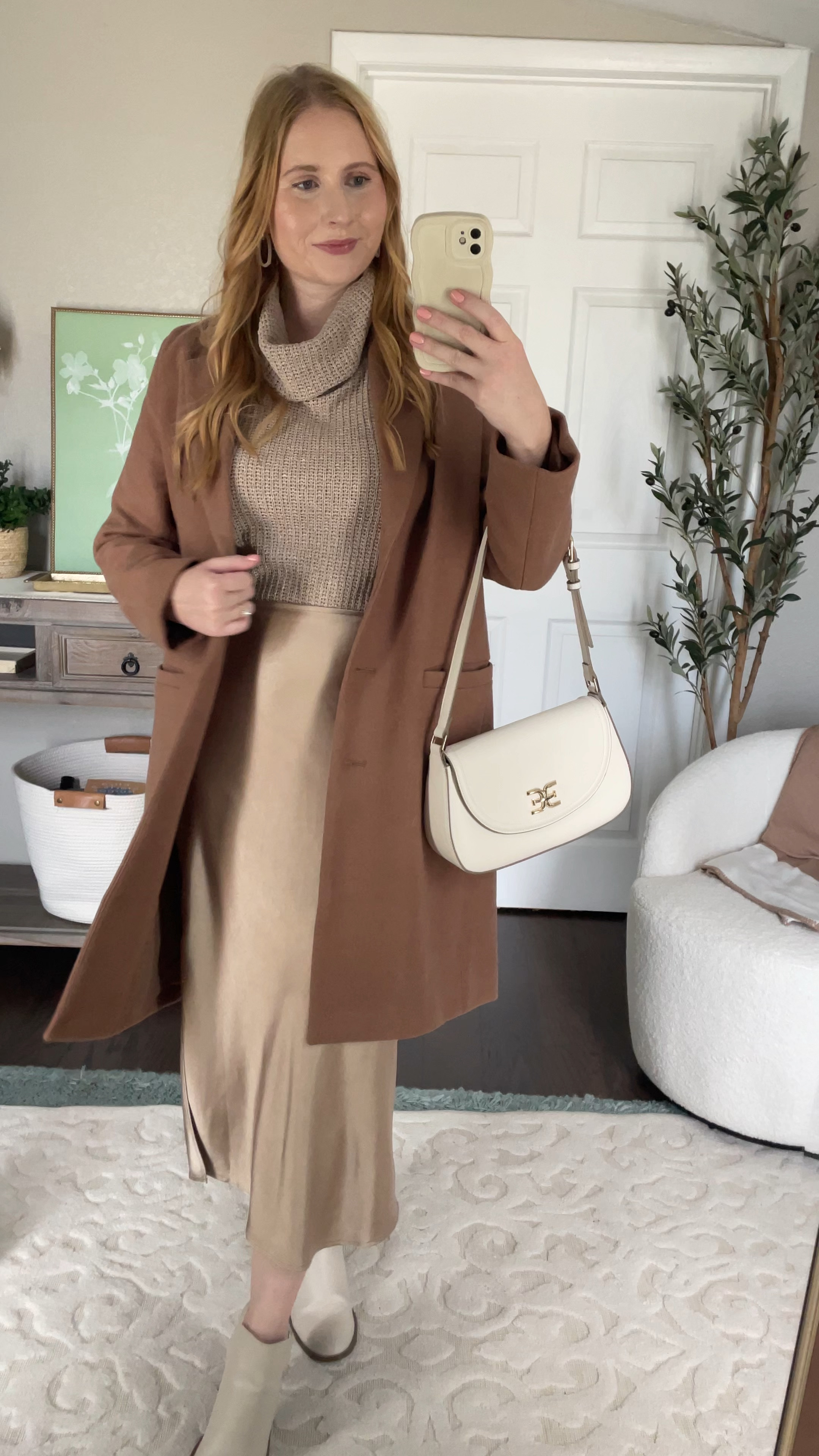 Fall Outfit Idea
Tan coat, cowl neck sweater, gold satin slip skirt, ankle booties 

#ltkvideo

#LTKsalealert #LTKFind #LTKxNSale