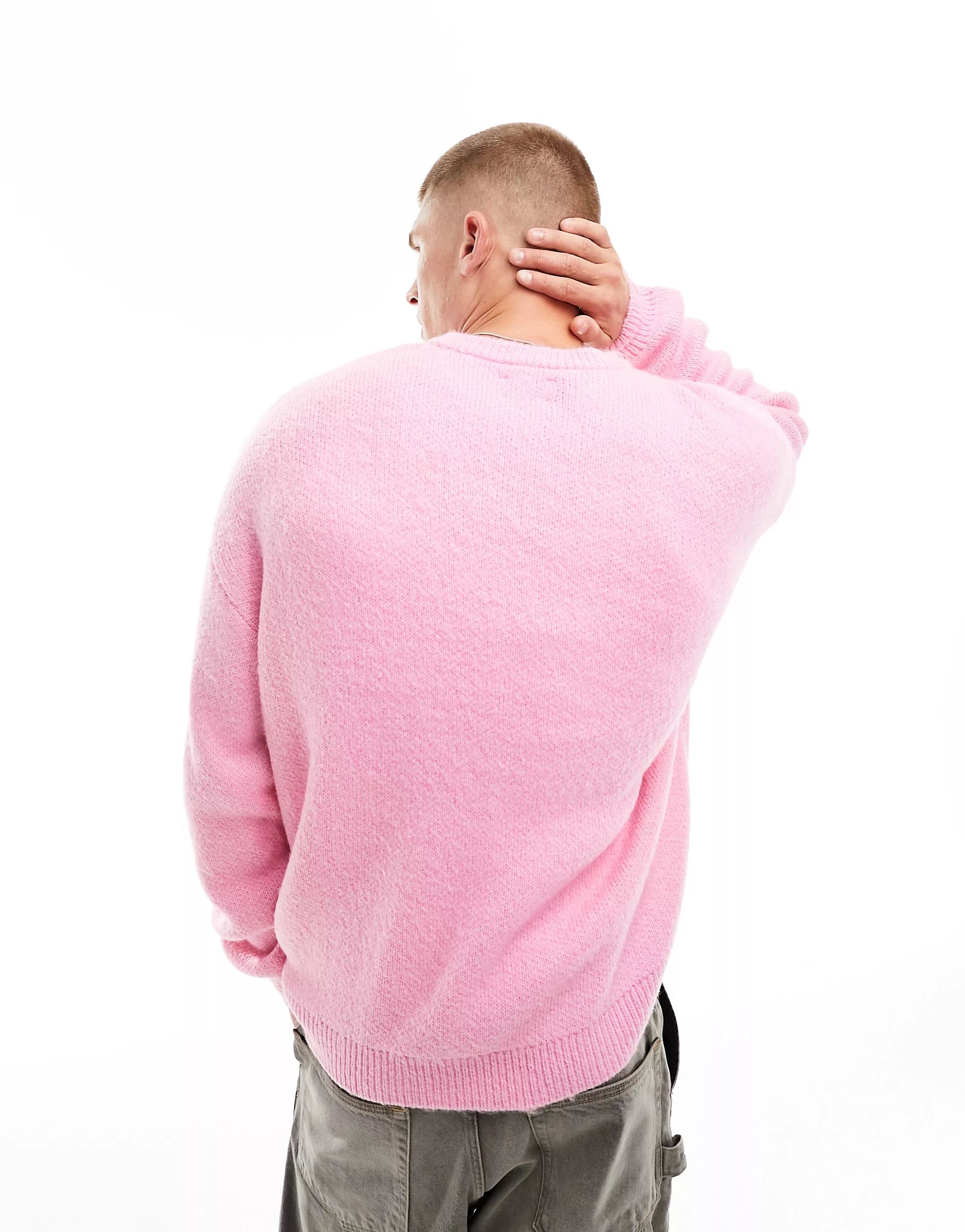 ASOS DESIGN oversized knitted fluffy crew neck jumper in pink | ASOS (Global)