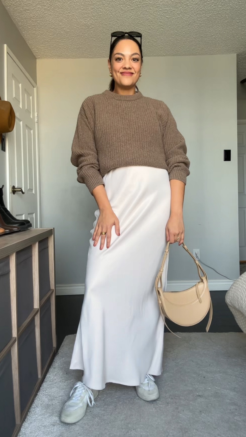 Ways to wear a crewneck sweater! Details below:

-Poppy Barley crewneck sweater in the colour dune. Made with 100% superfine lambswool. Super soft and versatile! I’m wearing a large. 
-Anthropologie cream maxi skirt, I have a medium. 
-Veja V-10 sneakers  
-COS gold mini hoops. 
-Celine Triomphe 52mm sunglasses in black acetate. 