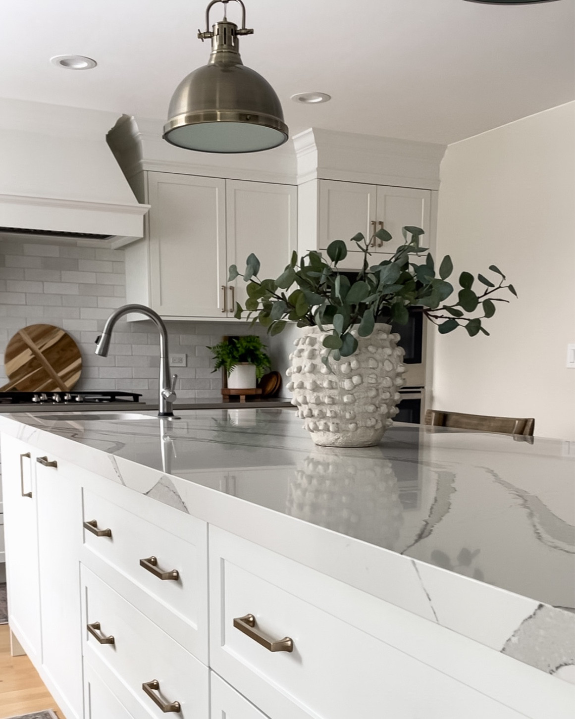 Kitchen design. Home decor. Kitchen lighting. Island pendant. Vase. Anthropologie. Drawer pulls. Hardware. Kitchen faucet. Charcuterie Board. Counter stools  

#LTKFind #LTKhome