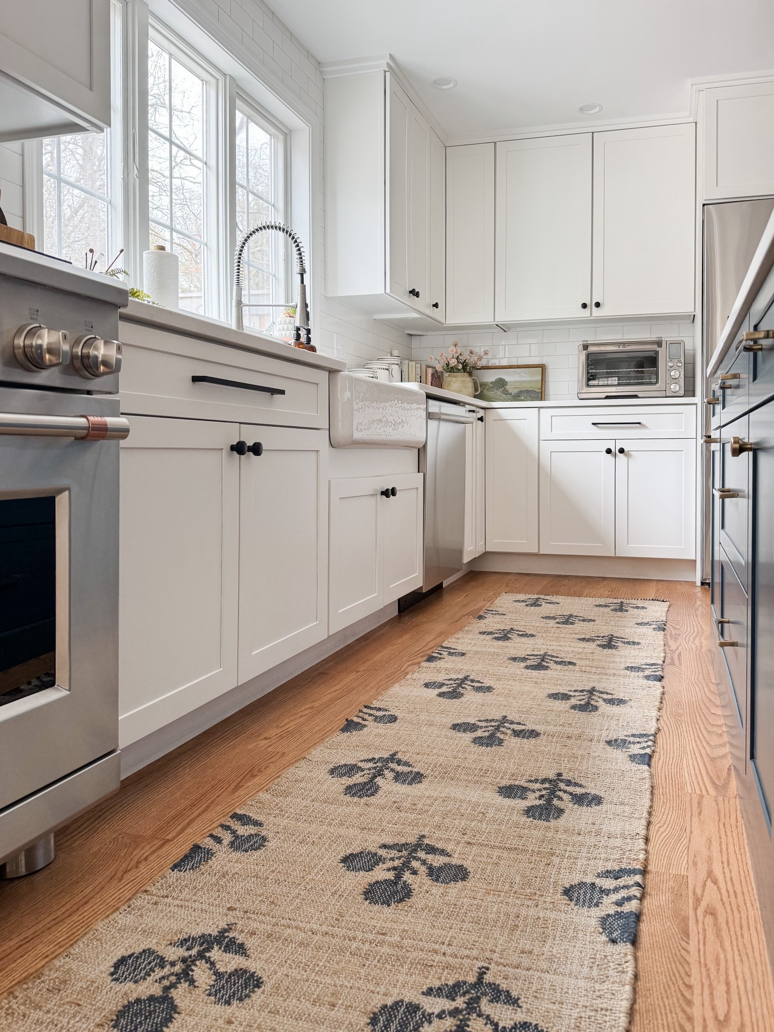 Coastal kitchen styled with navy island, white cabinets, neutral runner rug, and simple kitchen decor for a light and layered coastal space.

coastal kitchen decor, navy kitchen island, neutral kitchen runner rug, white cabinet kitchen, coastal kitchen styling, neutral kitchen decor, light coastal kitchen design, kitchen island runner rug, sherricalnanhome

#LTKHome