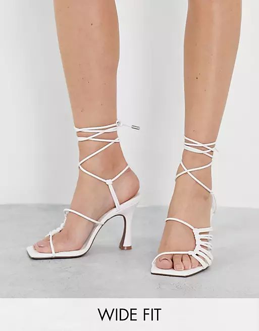 ASOS DESIGN Wide Fit Herald knotted caged tie leg mid heeled sandals in white | ASOS (Global)