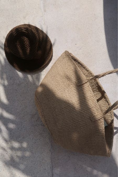 Beach tote and straw hat for vacation 

#LTKFindsUnder100 #LTKSwim #LTKSeasonal