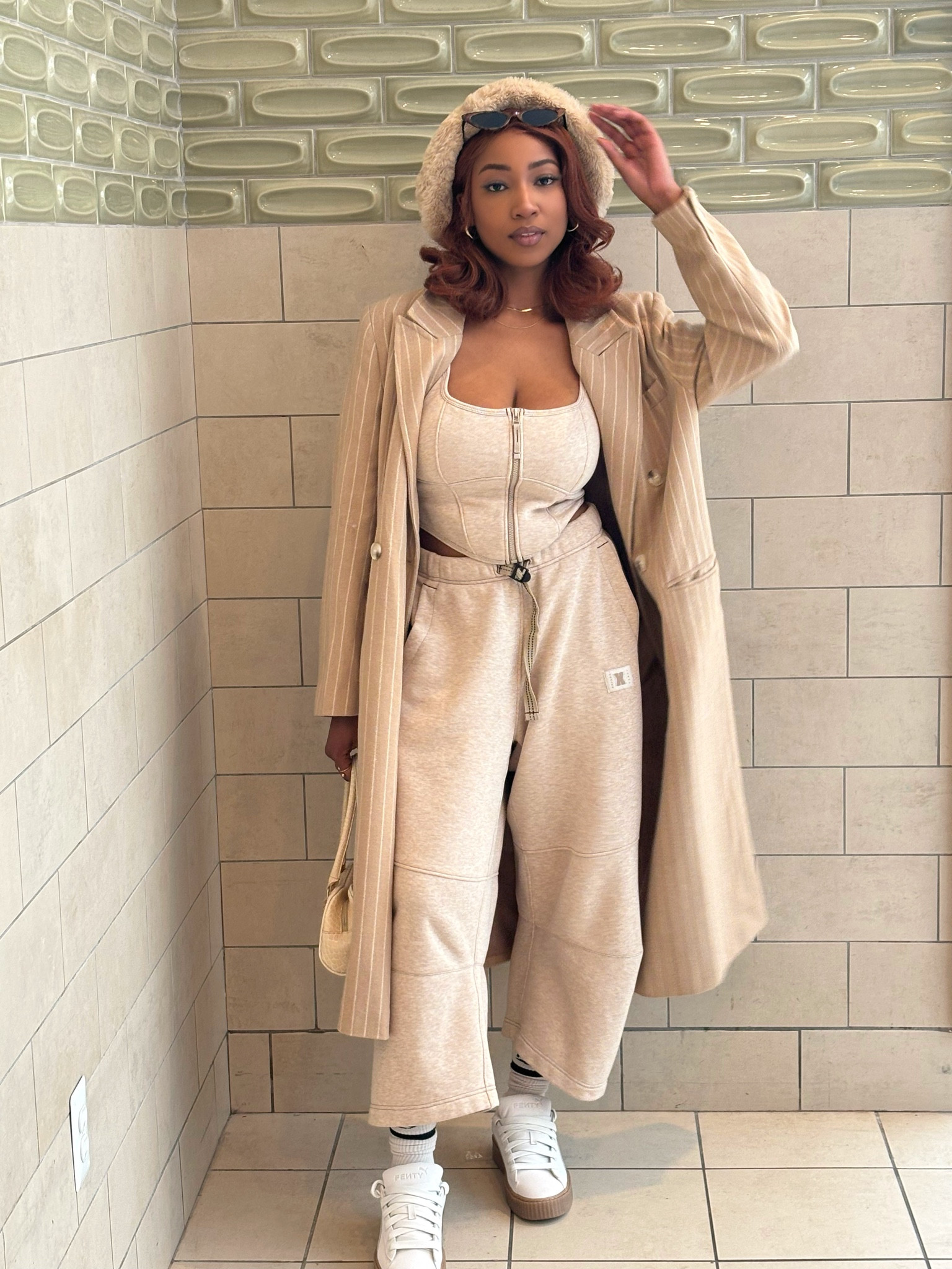 Beige brigade this is for you! This Savage X Fenty set got me so many compliments strolling through the mall, it’s incredibly comfortable and the quality is impeccable. The corset top has some structure from the thick zipper and gives a touch of sexy and sophisticated. Which I enhanced by adding my slightly vintage Topshop coat and hat. I kept my shoes on the sporty side with my Fenty creepers, also insanely comfortable. I’ve tagged alternatives for my older pieces but definitely get into this set! 🤎

#LTKActive #LTKSeasonal #LTKStyleTip