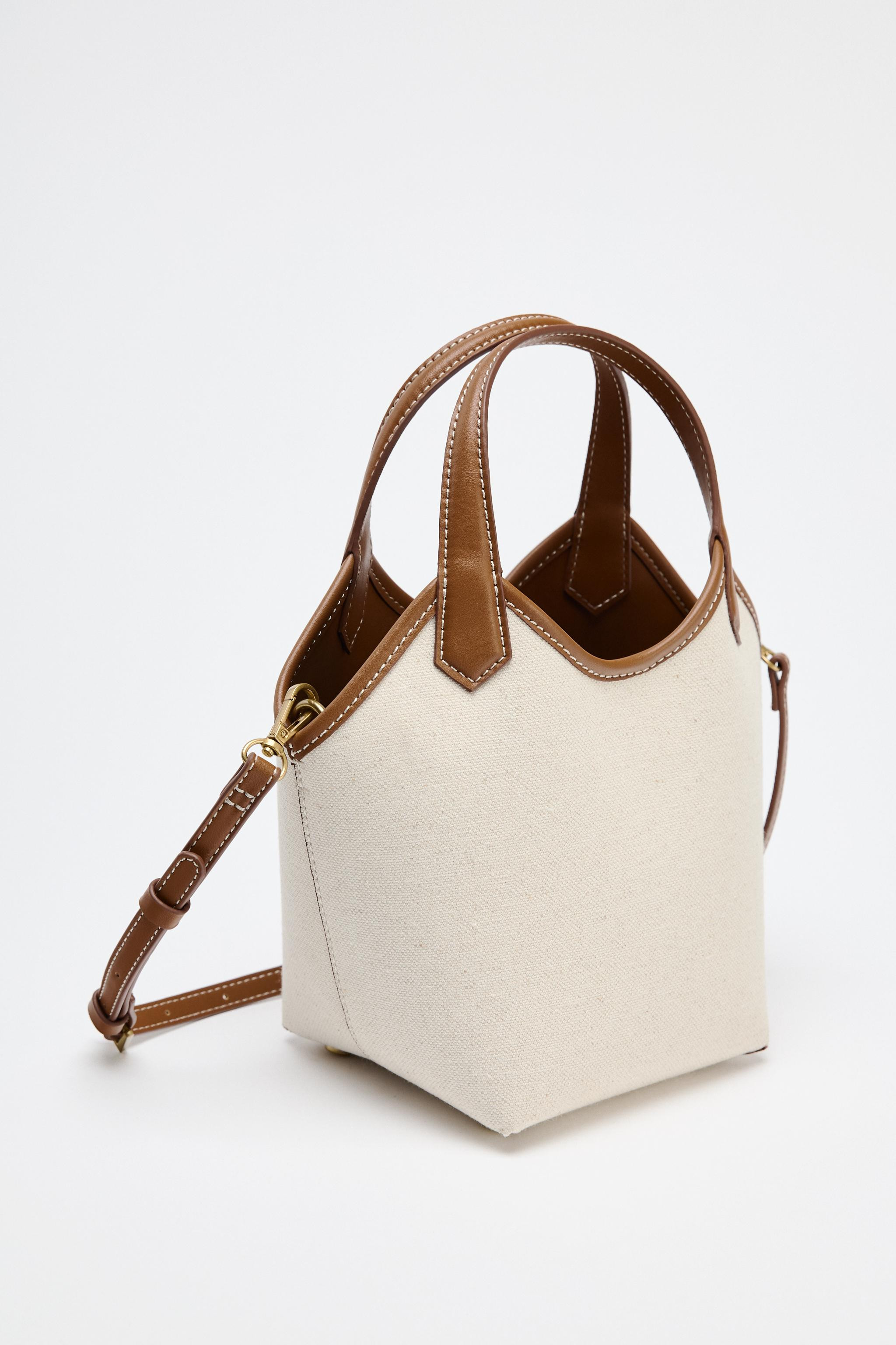 Mini shopper bag in canvas fabric. Handles and a removable crossbody strap. Contrast topstitching... | Zara US