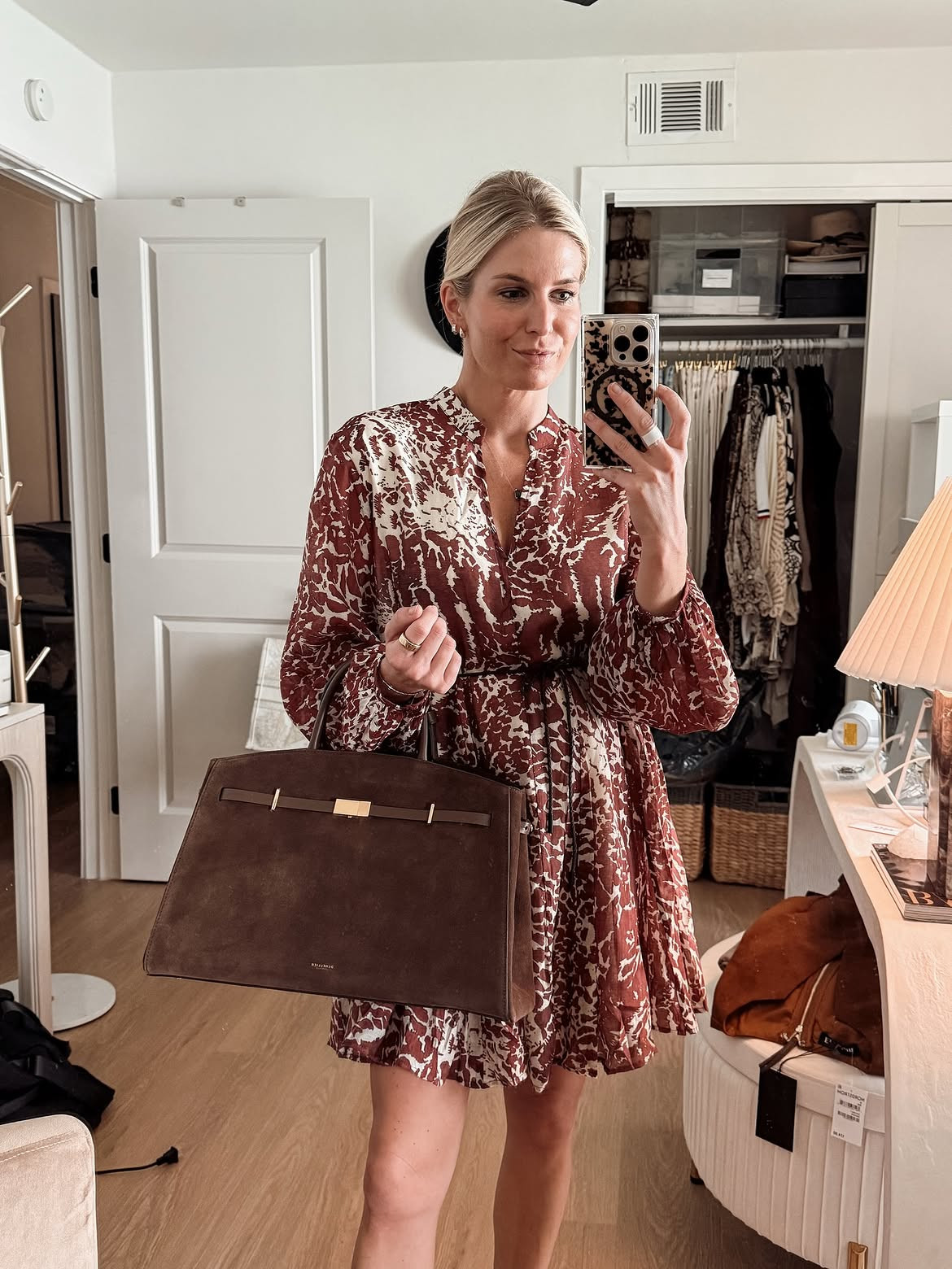Autumn's uniform: a printed long-sleeve minidress, a structured suede tote, done.  

 #LTKootd #LTKSeasonal #LTKWorkwear