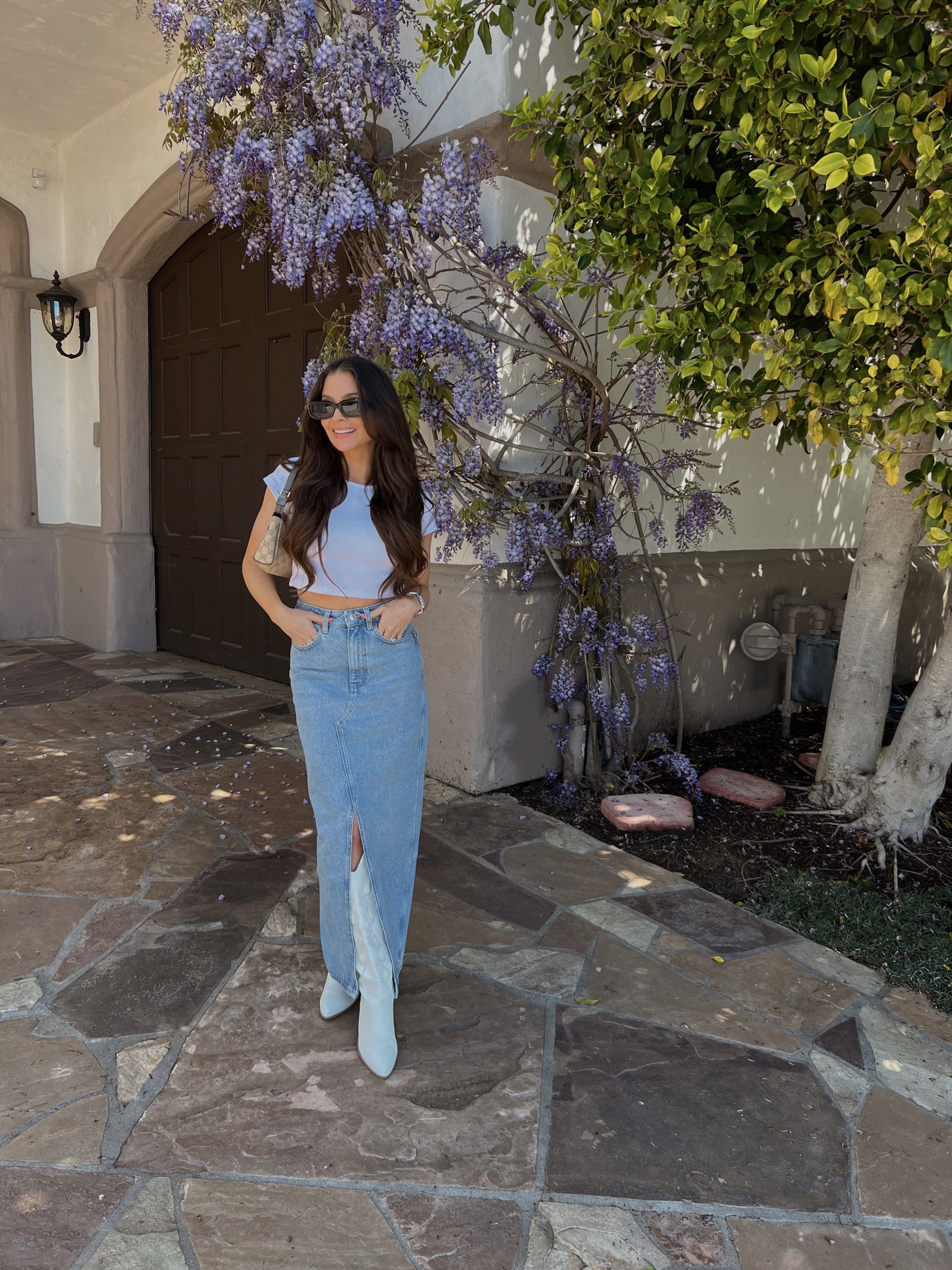 Coastal cowgirl outfit idea - white cropped tshirt (xs), denim maxi skirt, white cowboy boots 

Country concert outfit ideas, spring outfits, spring trends 

#LTKshoecrush #LTKSeasonal #LTKunder100