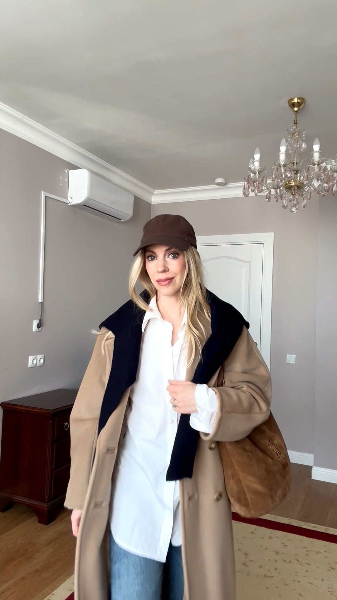 Chic travel look, airport outfit, spring break, camel coat, @Zara navy sweater, @Shopbop dark wash jeans, @Zara leather loafers, YSL side bucket bag 

#LTKspring #LTKTravel #LTKspringtrends