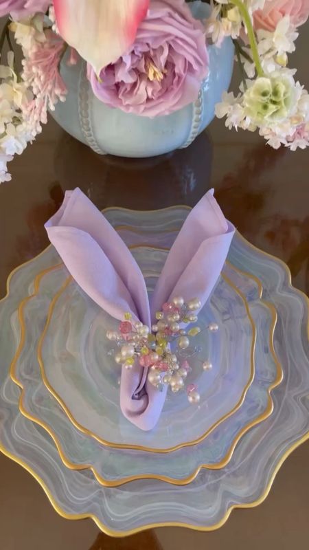 Easter Napkin Fold!! An easy napkin fold to adorn your easter tablescape. Love these pastel colors 

#LTKSpringSale #LTKfindsunder100 #LTKstyletip