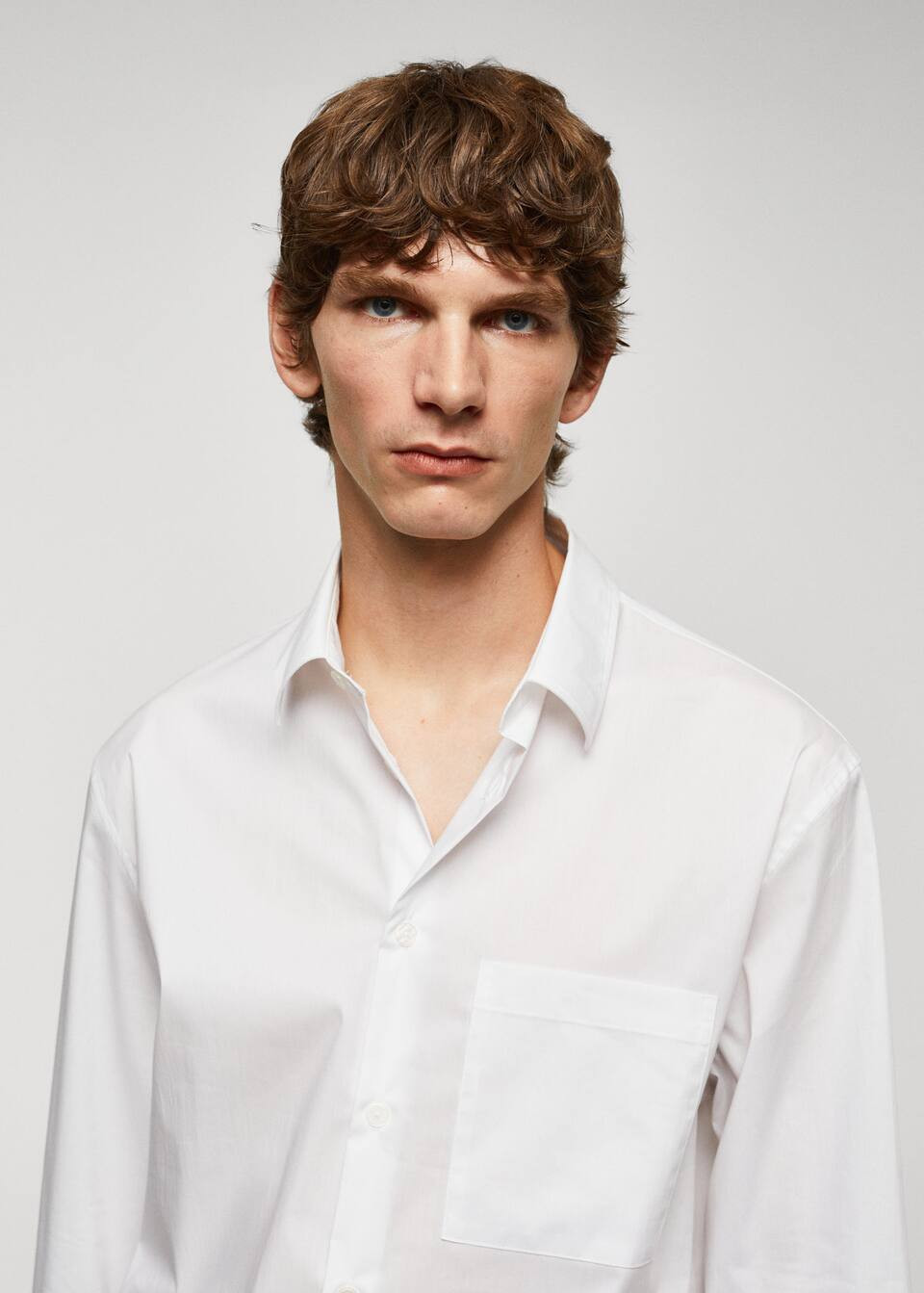 Regular fit-hemd aus baumwolle mit tasche -  Herren | Mango Man Deutschland | MANGO (DE)