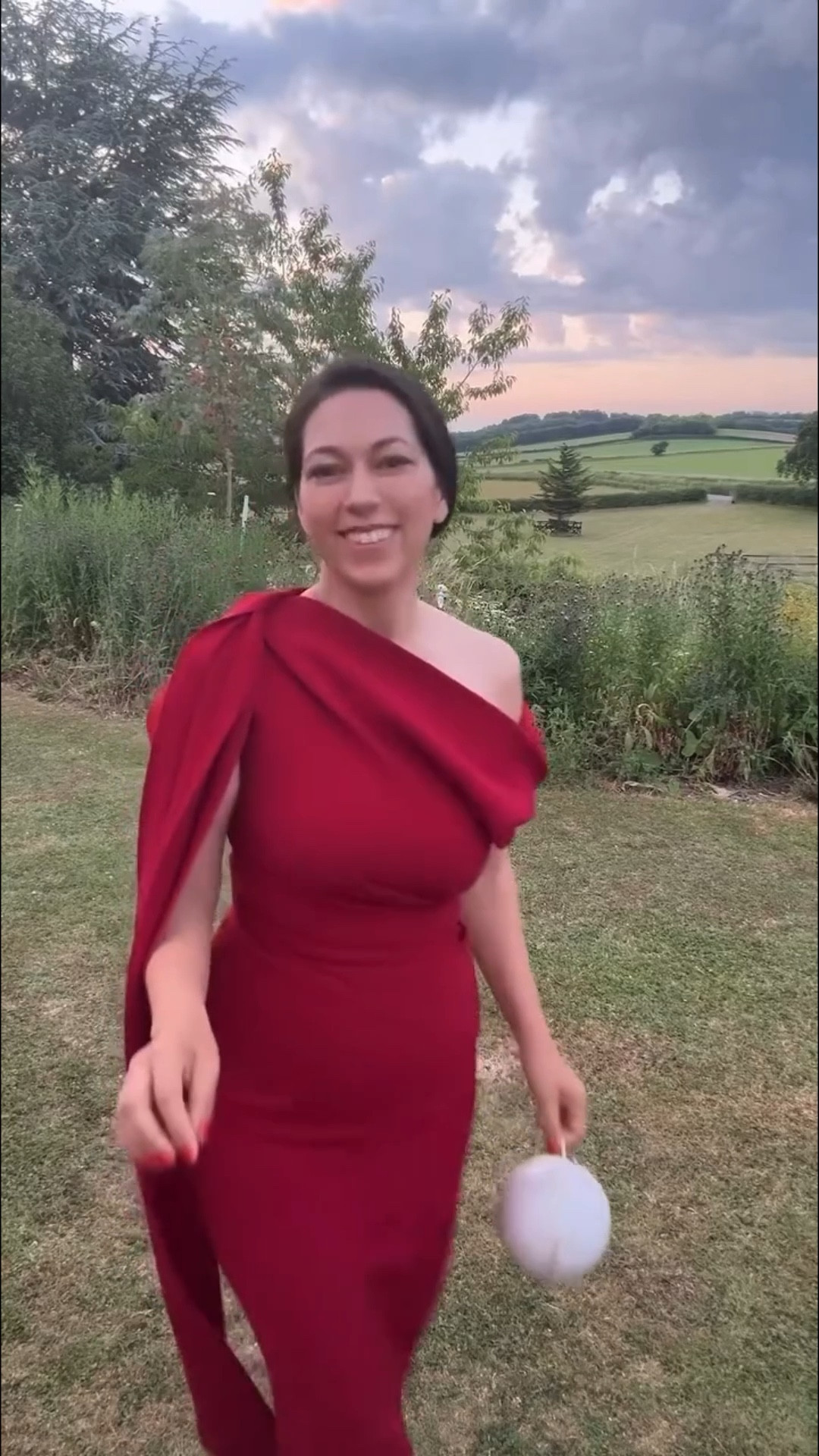 Family wedding at a beautiful home in England, amazing dress from @renttherunway (#rtrpartner) , whimsical bag from @auvrelifestyle, perfect sandals from @prada, and of course heel petals. Such an amazing evening getting to be there as my cousin married a great guy. 

#rtrmuse 

Comment SHOP below to receive a DM with the link to this post on my LTK ⬇ https://liketk.it/5hBdv