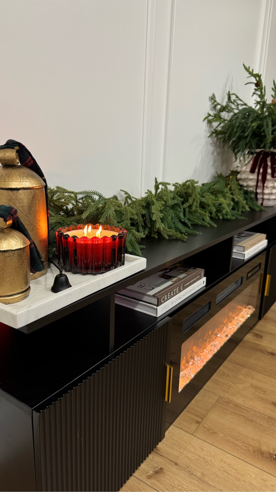 Little by little the house is getting its Christmas spark✨

The warm little flame colors on the stand — and even the gentle heat — just make everything feel extra cozy this season🤍

🔗Make sure you’re following me to receive my DMs — comment COZY and I’ll send you the link to shop this fireplace!
.
.
.
#christmashome #cozychristmasvibes #holidaydecorideas #christmasdecorinspo #modernhomeaesthetic #neutralhome #modernlivingroom #fireplacemanteldecor #christmasstyling #cozyhomestyle #holidayhomedecor #festiveseasonvibes #christmasaesthetic #homeinteriorinspo #seasonaldecor #cozylivingroom #ltkhome #amazonhomefinds #homeideas #homedecorinspo #christmastimeishere #wintercozyvibes #modernfarmhouseinspo #homesweethome 

#LTKHome #LTKHoliday #LTKSaleAlert