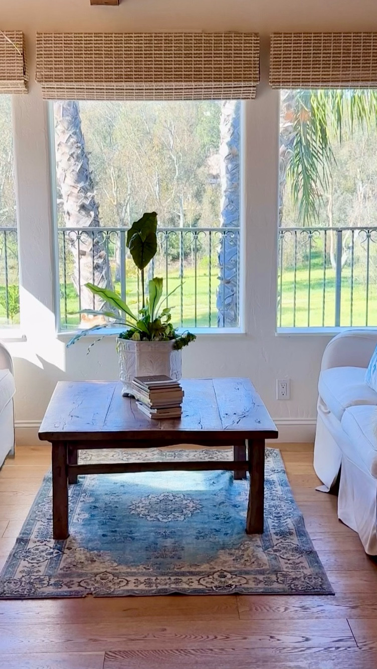 Cozy relaxation nook. 🩵

I styled this area with a white sofa on each side, a vintage wood coffee table, a pretty blue area rug, floral throw pillows, and a pretty plant in a white pot.

Home decor allows for so much self expression and creativity. 

#throwrug #whitecouch #marneystidbits #vintagetable #artificalplant

#LTKHome #LTKSaleAlert #LTKSpringSale