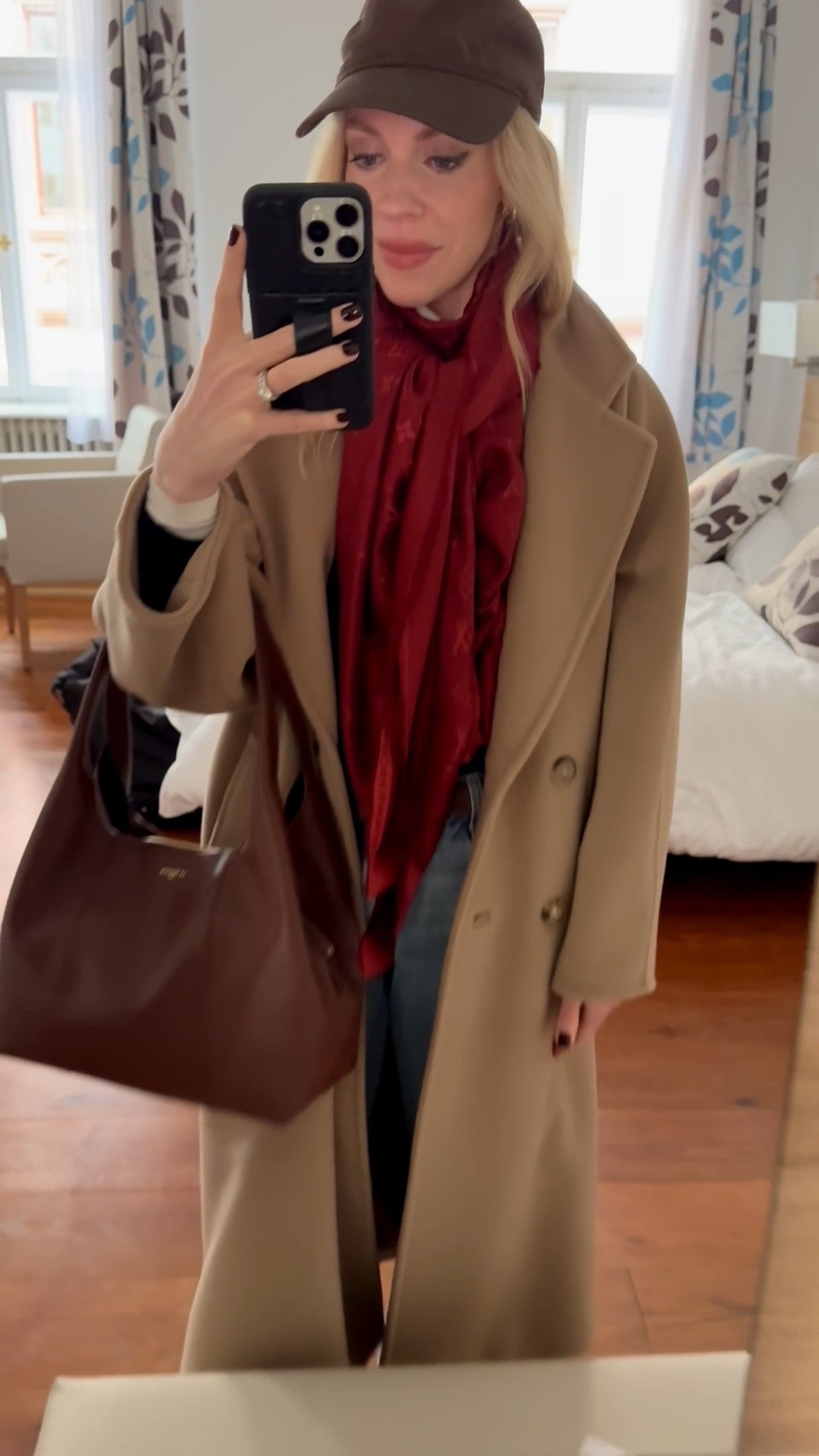 Spring outfits 2026, travel look, @Zara baseball cap, camel coat, red Louis Vuitton scarf, Levi’s baggy 90’s jeans, dark brown spring handbag 

#LTKSaleAlert #LTKOver40 #LTKTravel