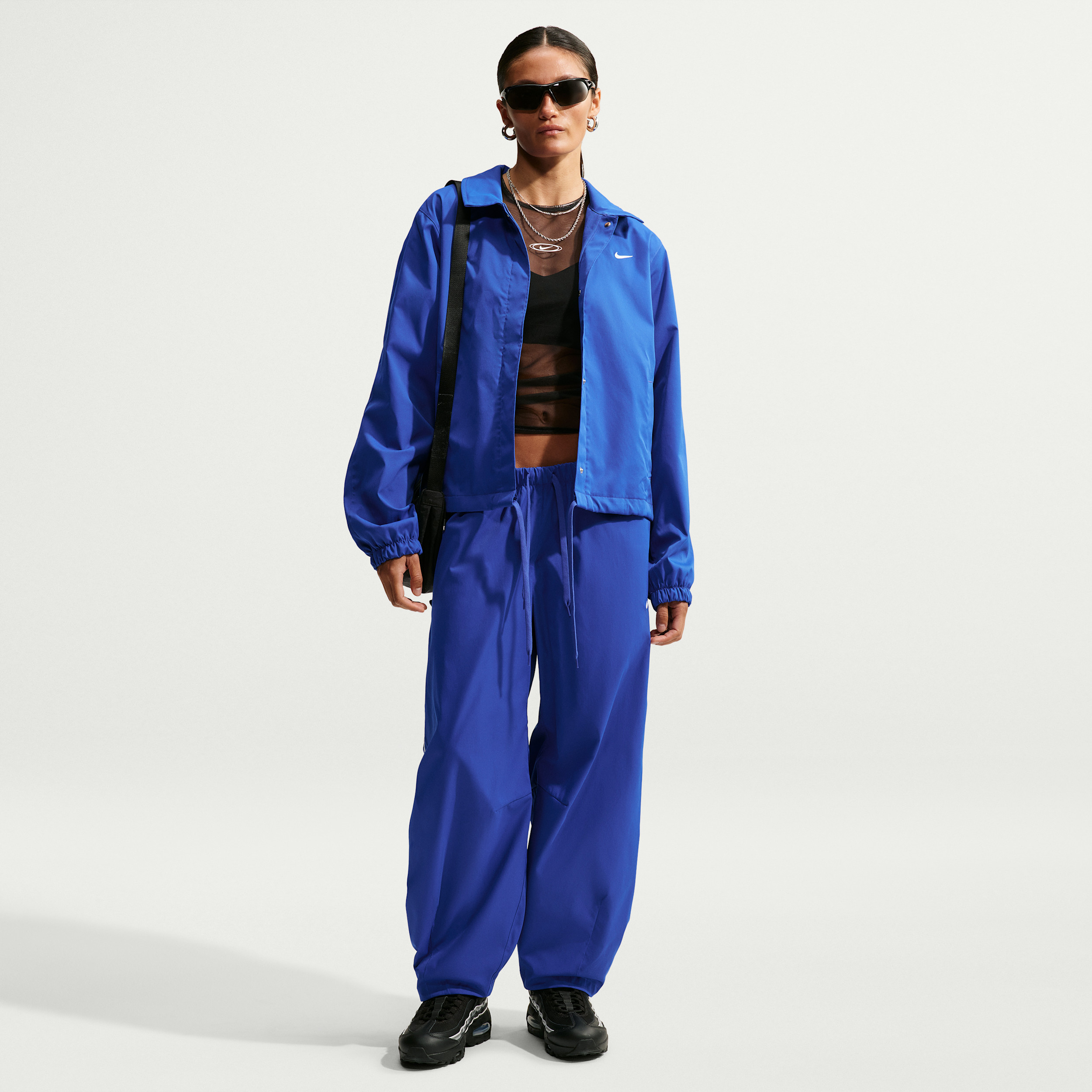 Women's Nike Sportswear Loose Mid-Rise Barrel Pants in Blue | IU1981-417 | Nike (US)