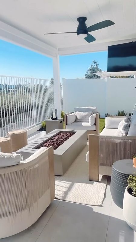 This outdoor living area turned out so good! 👏🏻 

You don’t need a huge space for it to feel luxurious! Outdoor TV, ceiling fan, heaters, power sun shades, fire pit table, beautiful flooring, comfy furniture AND I haven’t even showed you the view! 
…………………………………………………………
With my online interior design services, I design, you implement, and together we create a cohesive design plan tailored to your style! 🙌🏻 Click the “Get Started” link in bio to learn more about my process. I would love to work with you! 🏡
…………………………………………………………
#ltkhome #patiodesign #patiodecor #patiofurniture #patioinspo #patiolife #patiostyle #backyard #patioliving #outdoorliving #patiotime #outdoorstyle #outdoorlivingspace #outdoorlivingroom #outdoortv #remodel #renovation #homerenovation #homeremodel #westelm #mywestelm #westelmstyle #californialiving 
