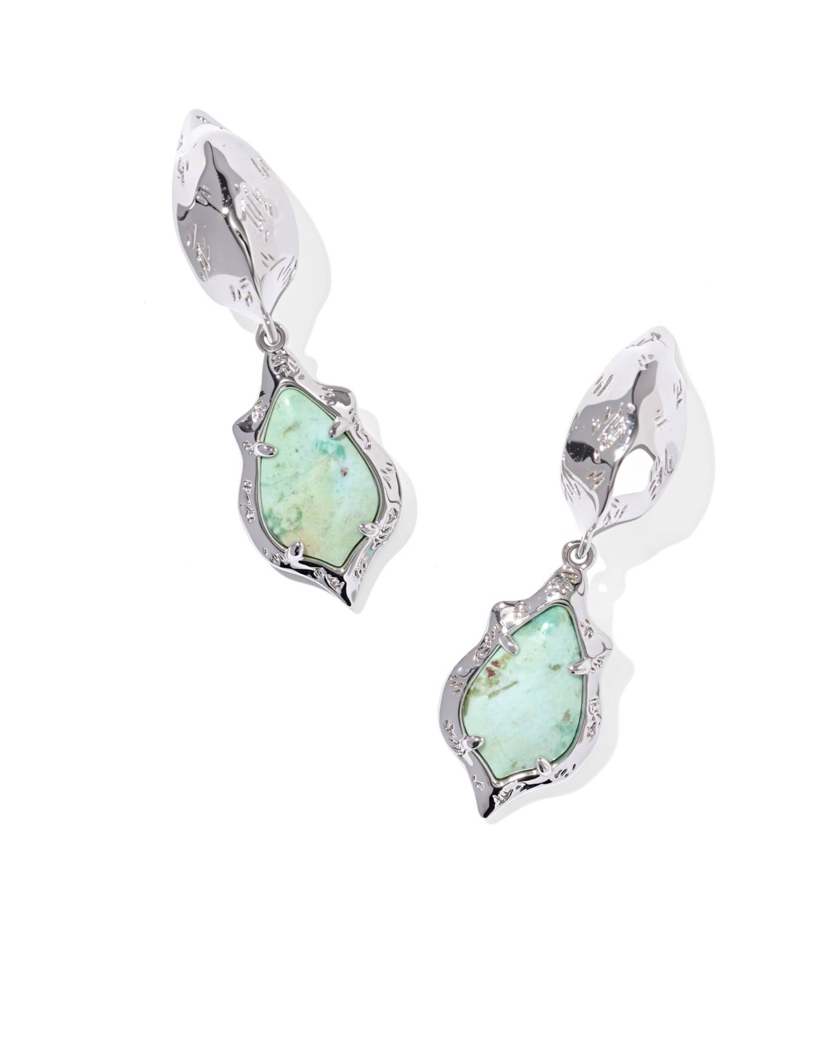 Add an elegant and nature-inspired touch to your daily look with the Adriana Scallop Frame Silver Huggie Earrings. Under $80.

Keywords: Spring break accessories, spring break outfit, Kendra Scott, blue drop earrings, gold drop earrings, Easter accessories, spring outfits, spring accessories, summer accessories, vacation beach outfits, vacation beach accessories, travel accessories, date night outfits, date night accessories, resort wear 2026, resort outfits, wedding guest outfits, wedding guest accessories, silver drop earrings, silver jewelry, gifts for her

#LTKSaleAlert #LTKTravel #LTKgrwm