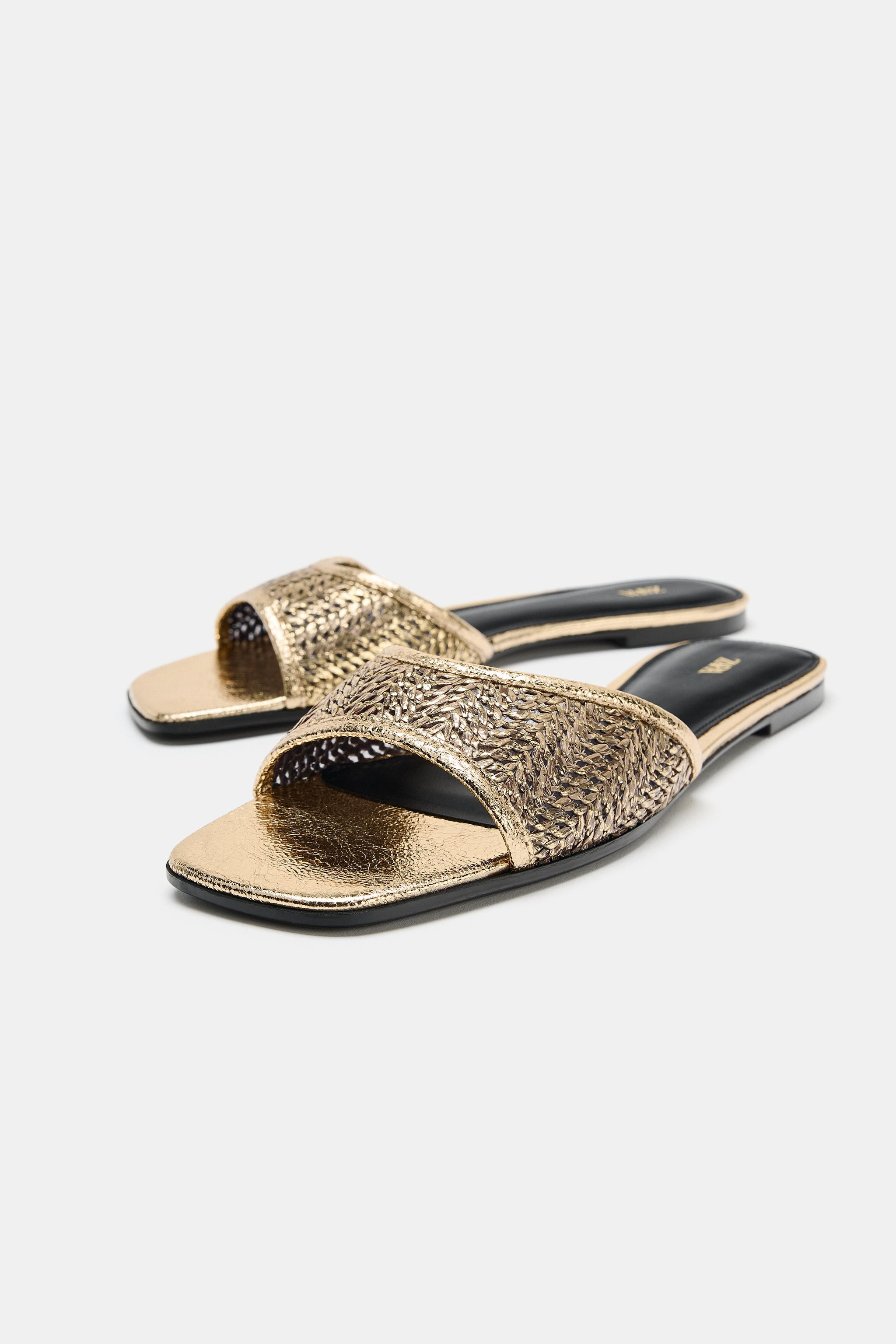 Flat metallic-effect slide sandals. Braided strap detail at the front. Squared toe.Sole height: 0... | Zara US