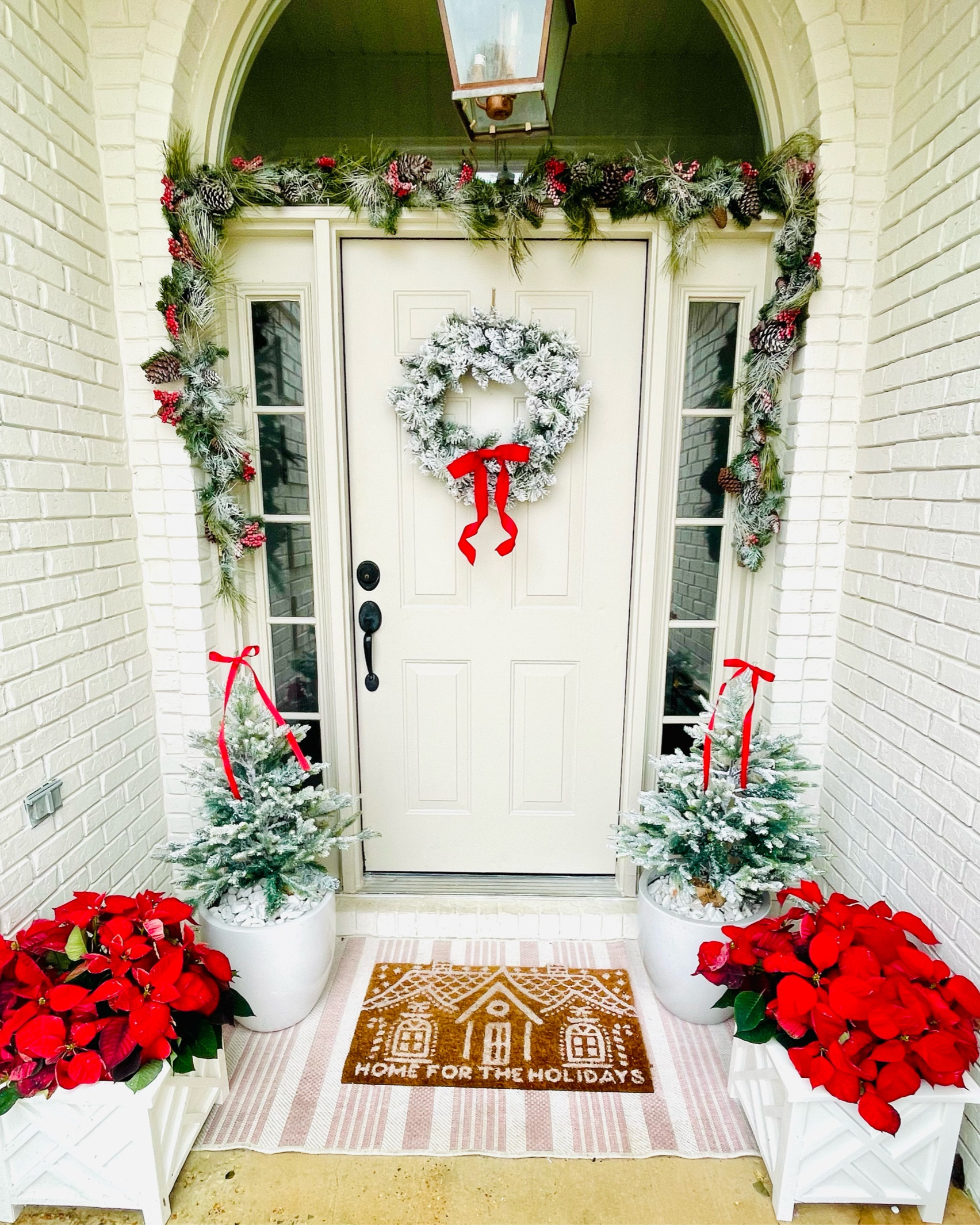 Christmas front door with touches of red 

#LTKHoliday #LTKhome #LTKSeasonal