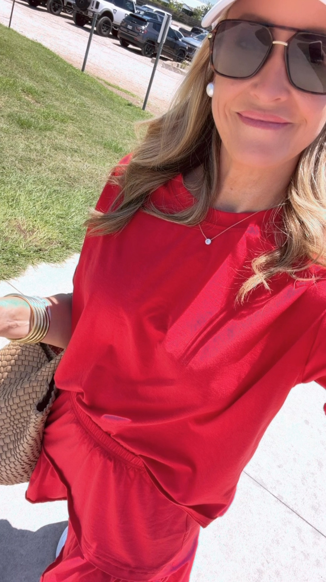 Sports mom outfit. This skirt does not have shorts so FYI. The tee is longer and looks cute untucked or partially tucked
