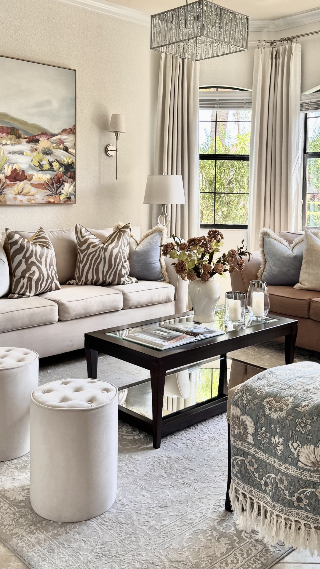 Our cozy & layered living room decorated with beautiful warm neutrals and subtle touches of blue!🤎🩵

Fall Decor | Transitional Decor | Modern Decor | Traditional Decor | Southern Decor | Neutral Decor | Autumn Decor | Fall Stems & Florals | Coffee Table Styling & Accessories | Seasonal Decor | Home Decor | Fall Centerpiece | Drapes | Rug | Wall Sconces | Coffee Table Book

#LTKSeasonal #LTKHome #LTKdayinmylife