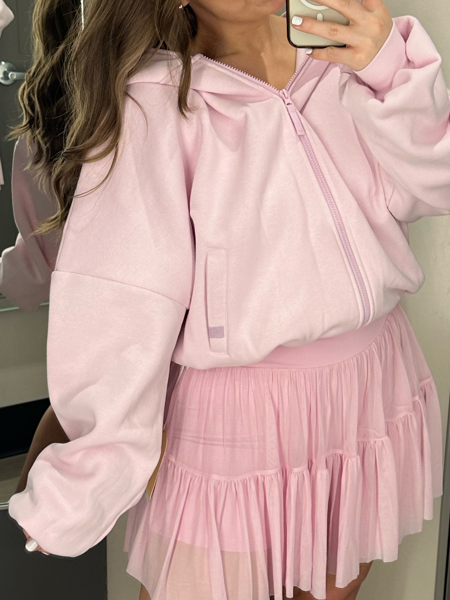 It’s called a Cloud hoodie for a reason! Super soft and comfy and runs very oversized for a cozy, romantic look. I’m wearing a medium here & would size down to a small.