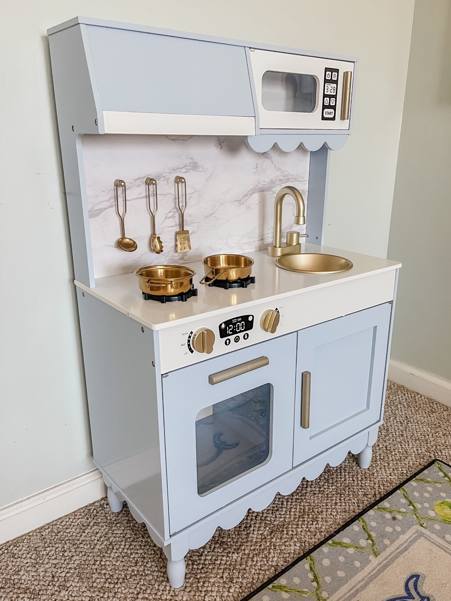 Play kitchen 
Blue play kitchen 
Playroom 
Scallop detail 

#LTKBaby #LTKSaleAlert #LTKKids