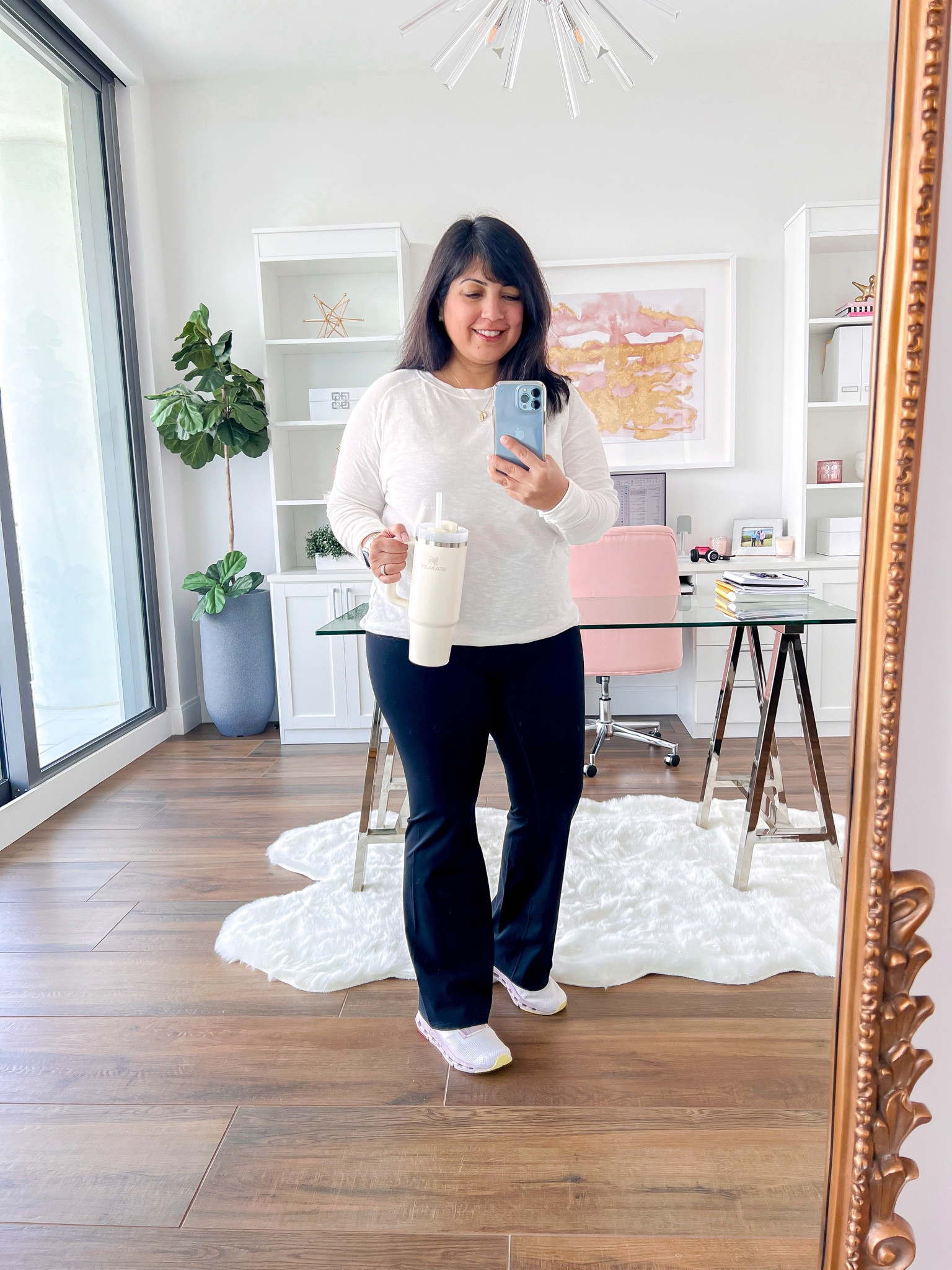 Spanx Booty Boost leggings in black on sale 50% off + an extra 10% off with code EXTRA10. Sale applies to this flare style as well as the regular leggings style in 7/8 length, full length and a side pocket version. Such a great deal! Wearing the flare pants here and in size XL petite. Zella long sleeve white tee size small. I own these in several colors and they’re a great wardrobe basic to have in your closet. They run big so size down! ON Cloudnova sneakers true to size. Electric Picks necklace. Stanley tumbler. This is a great athleisure outfit, comfy fall outfit and travel outfit! All of these pieces make great gifts for the holidays too! Everything else on the Spanx site is on sale 30% off!

#LTKGiftGuide #LTKActive #LTKCyberWeek